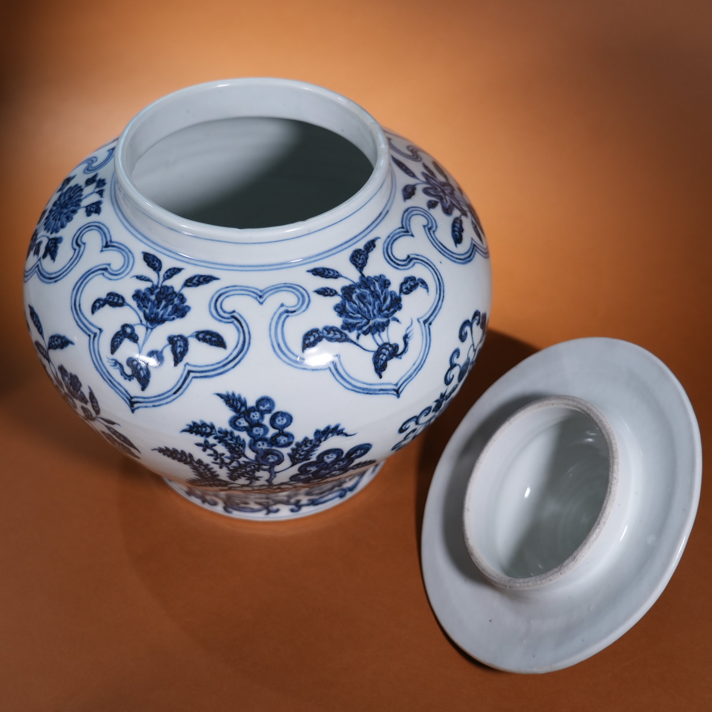 Ancient Chinese Blue and White Covered Jar with Branching Fruit and Flower Motifs