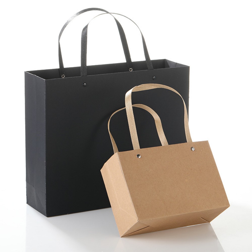 New Solid Color Rivet Rope Hard Kraft Paper Gift Bag, High Hardness Garment Handheld Paper Bag, Luxury Jewelry Packaging Tote Bag For Factory Bulk Wholesale