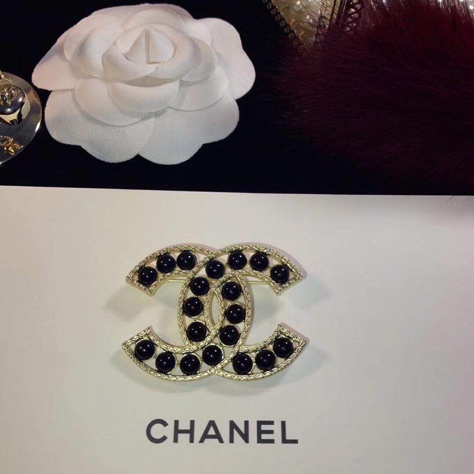 cc Brooch