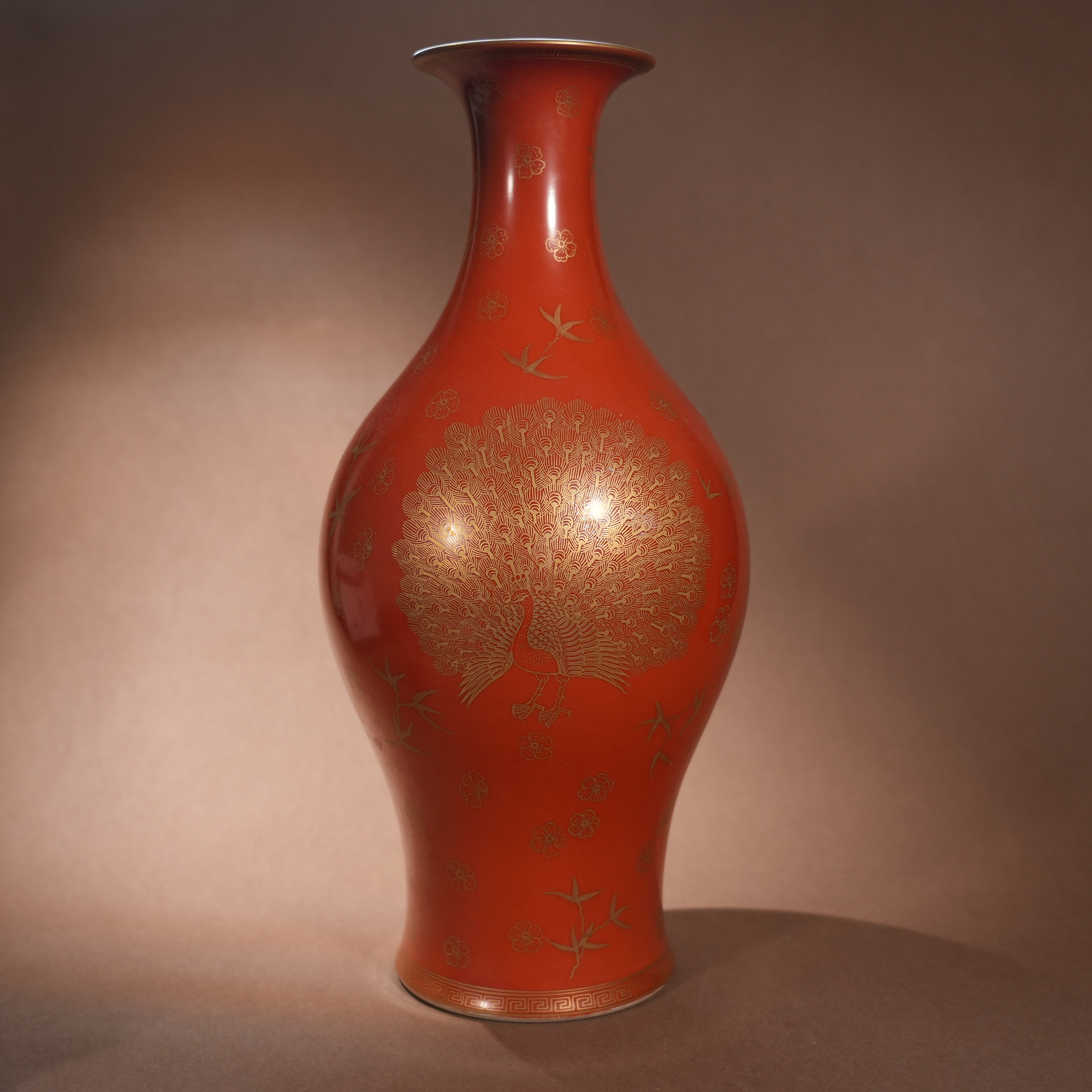 Ancient Chinese Coral-Red Ground Gilt-Decorated Olive Vase with Peacock Motifs