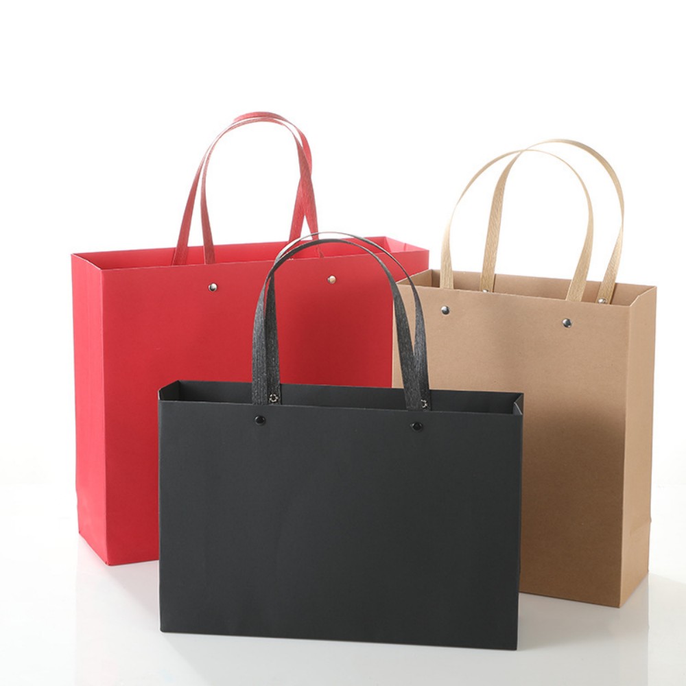 New Solid Color Rivet Rope Hard Kraft Paper Gift Bag, High Hardness Garment Handheld Paper Bag, Luxury Jewelry Packaging Tote Bag For Factory Bulk Wholesale