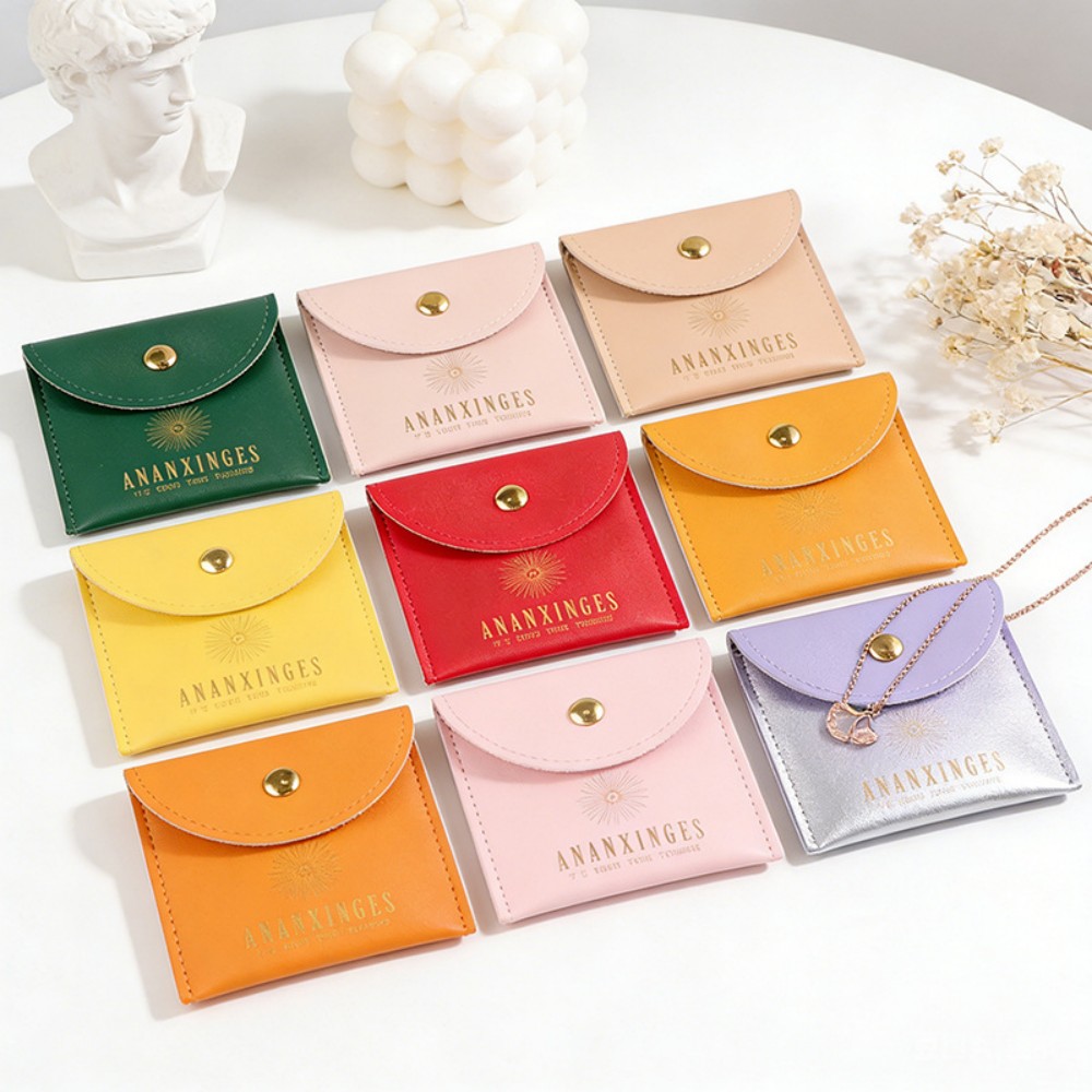 Flip Snap Button PU Leather Jewelry Bag, Minimalist High-End Ornament Storage Pouch, Small Gift Packaging Leather Bag, Portable Waterproof PU Accessory Bag, Custom Logo Personalized Leather Pouch, Factory Wholesale