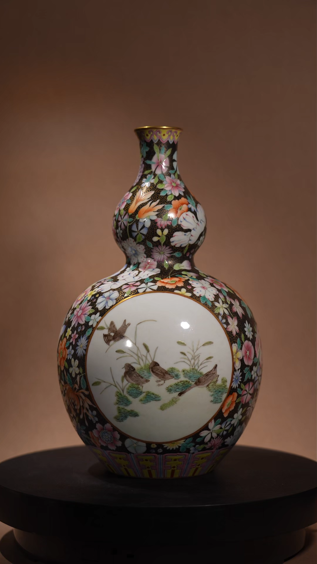 Ancient Chinese Black-Ground Famille Rose Gourd Vase with Hundred-Flower Pattern and Openwork Reed Wild Goose Motifs