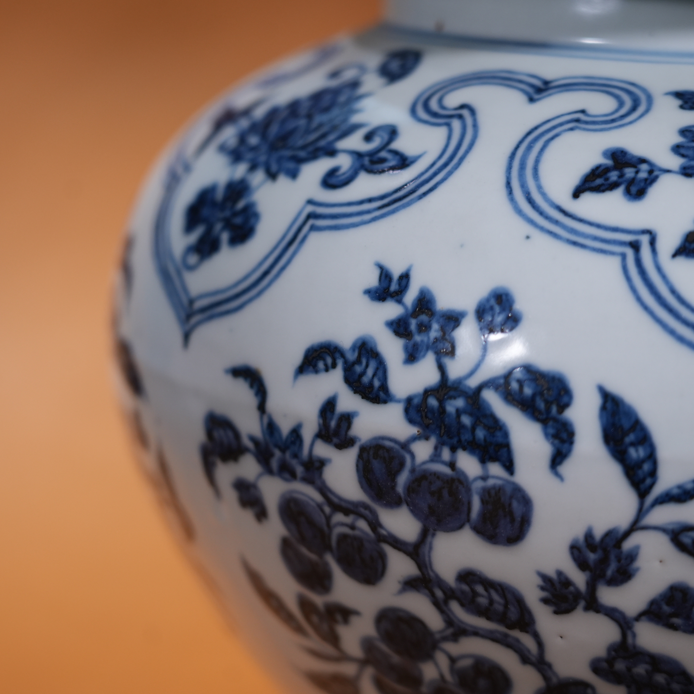 Ancient Chinese Blue and White Covered Jar with Branching Fruit and Flower Motifs