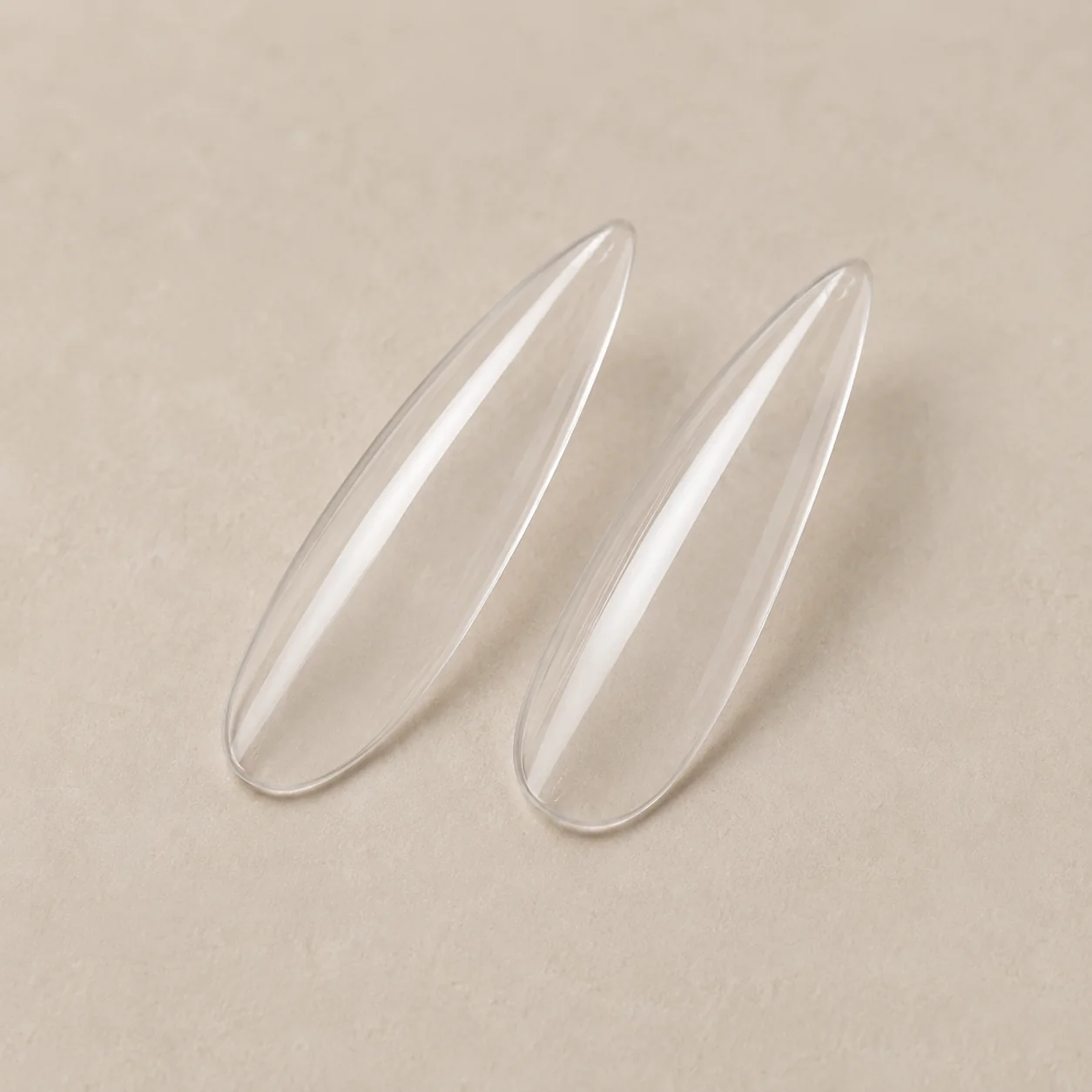 Clear stiletto nail extension tips for professional manicure
