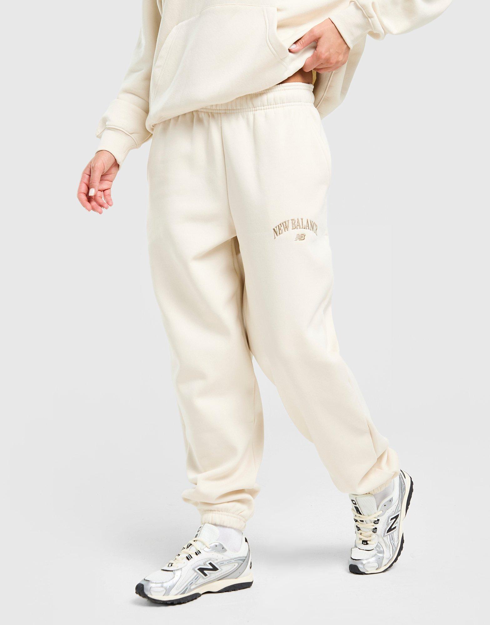 New Balance Varsity Cuffed Jogginghose Damen