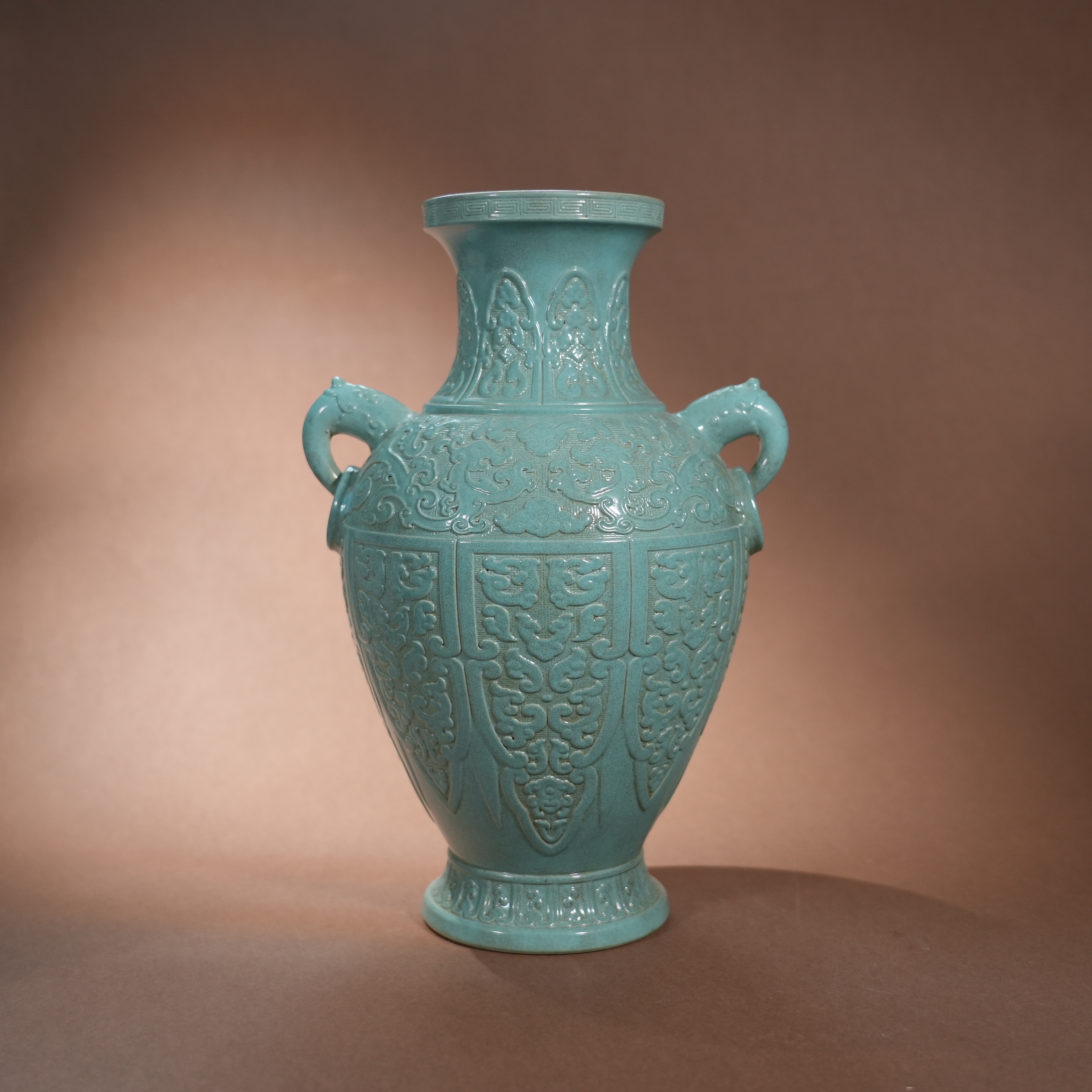 Ancient Chinese Turquoise-Glazed Vase with Carved Patterns and Beast-Head Ring Handles
