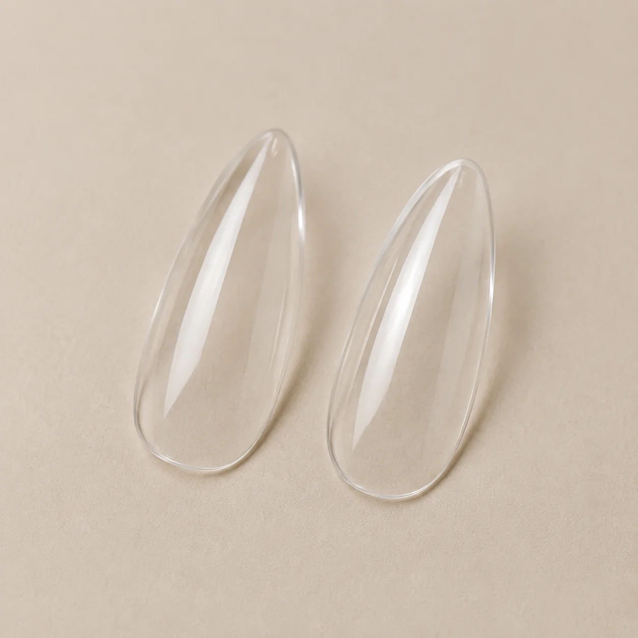 Clear almond nail extension tips for salon manicure and nail art