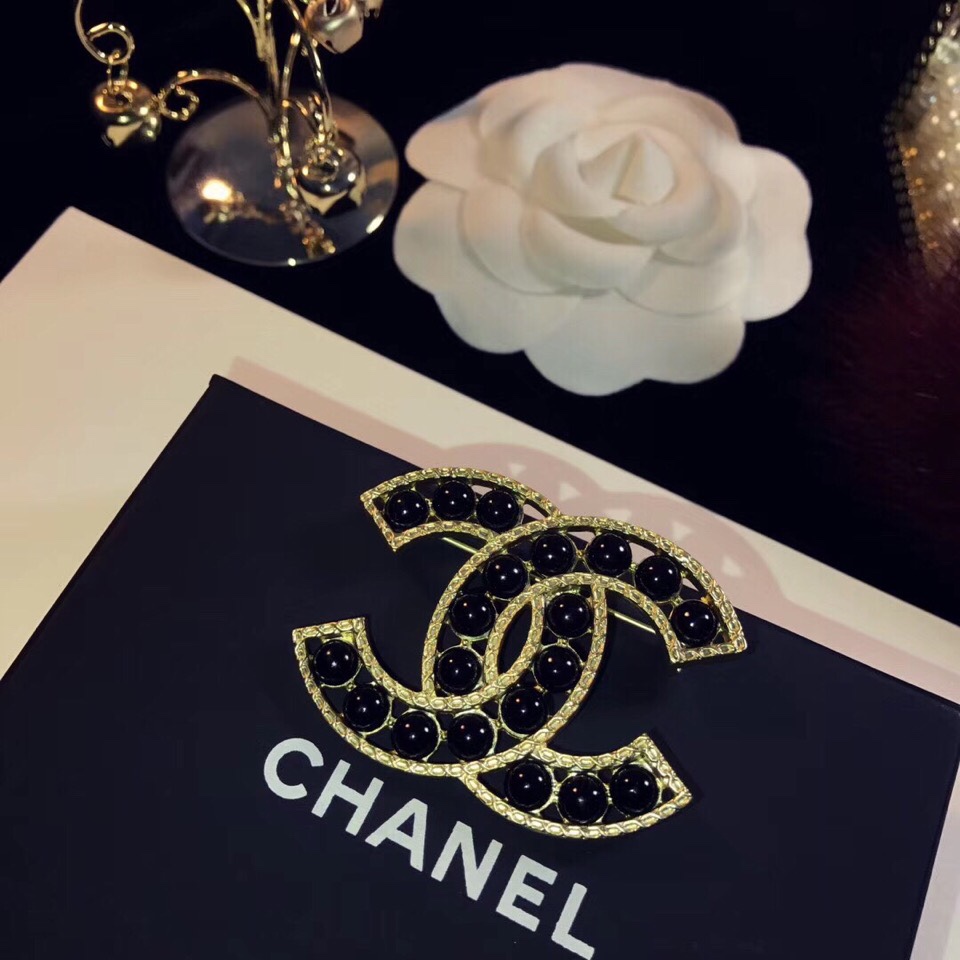 cc Brooch