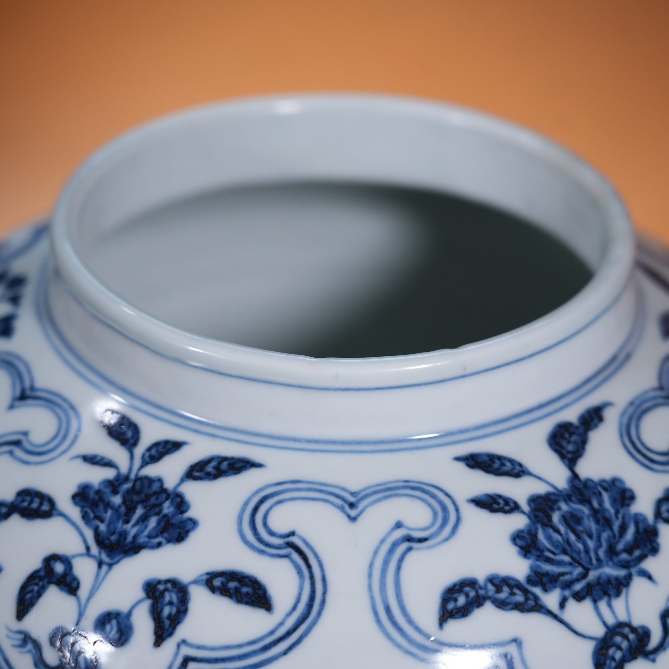 Ancient Chinese Blue and White Covered Jar with Branching Fruit and Flower Motifs