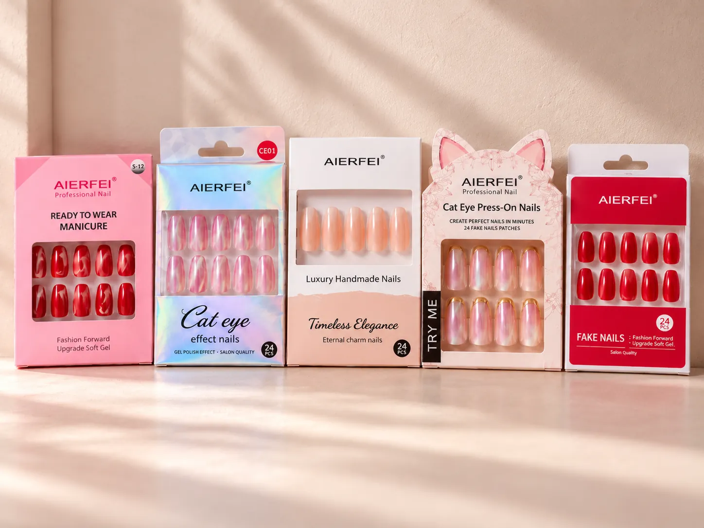 Five AIERFEI press-on nail products displayed in different pink, iridescent, nude and red packaging styles