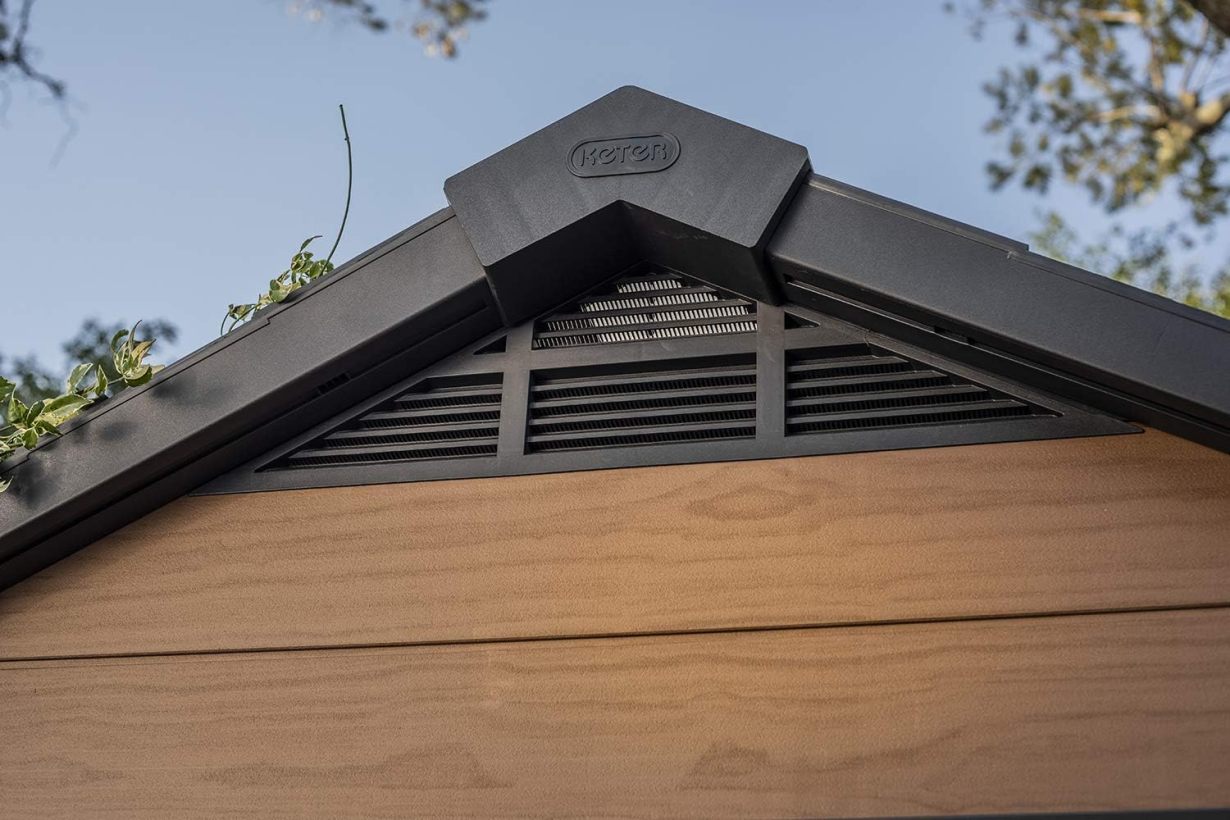 Keter Newton 7.5x11 Large Resin Outdoor Storage Shed Kit – Perfect to Store Patio Furniture. Garden Tools. Bike Accessories. and Lawn Mower. Mahogany Brown