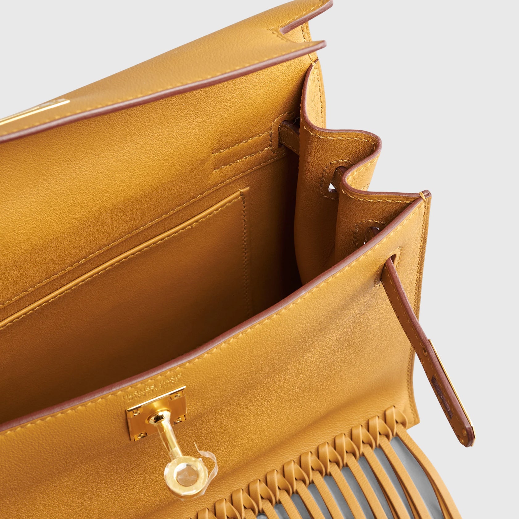 Hermès Kelly Danse II Anate w/ Fringe Swift Sesame Gold Hardware