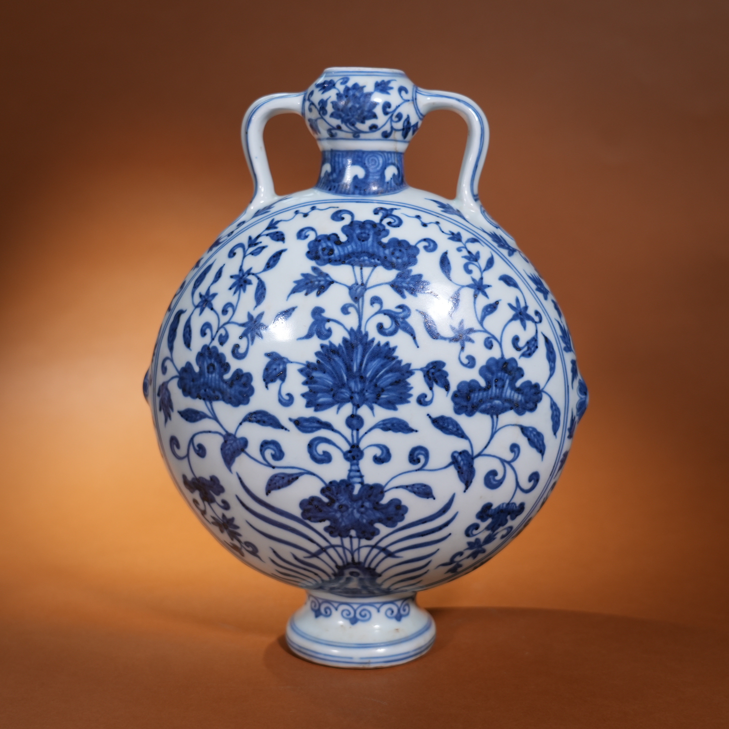 Ancient Chinese Blue and White Moon Flask with Interlocking Floral Motifs
