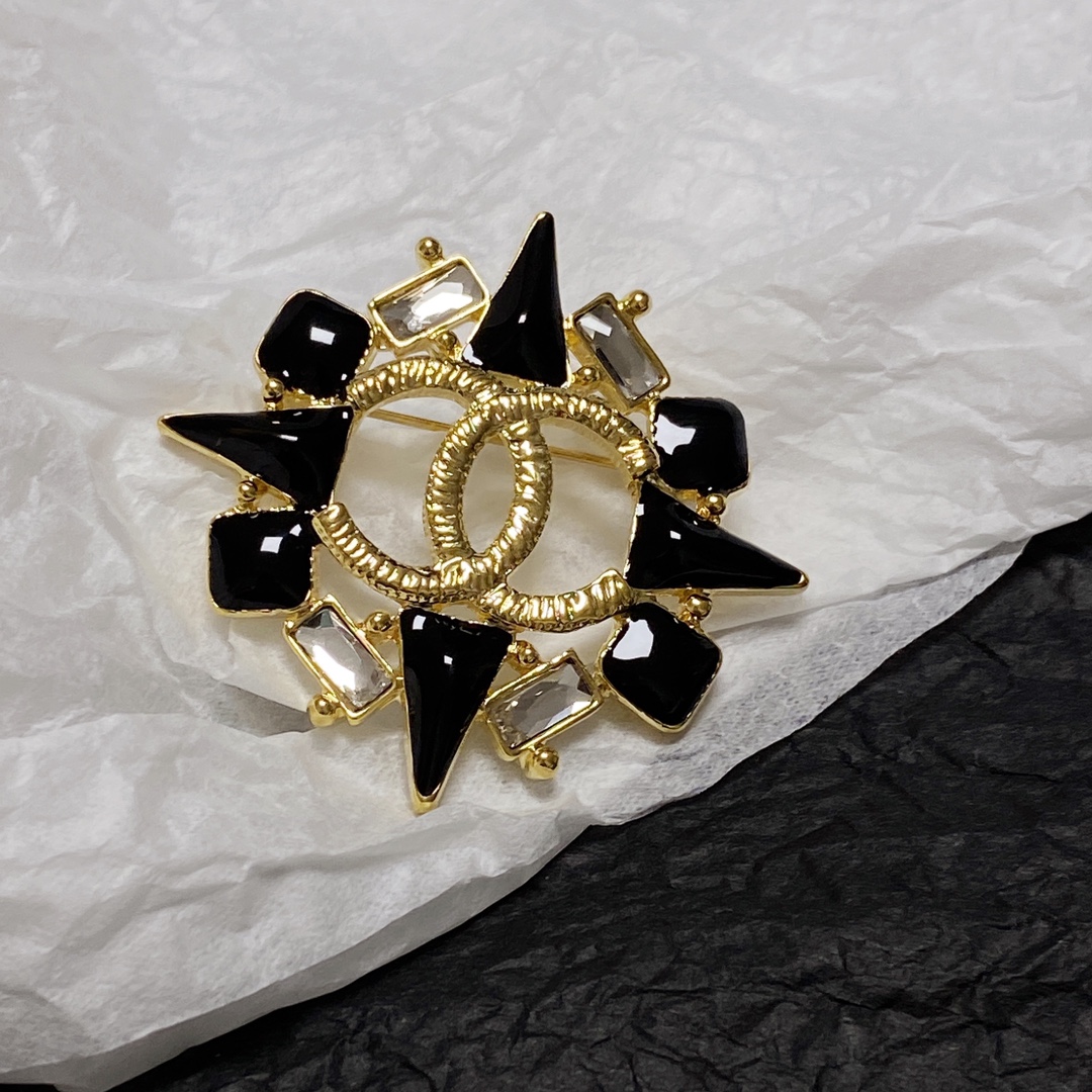 cc Brooch