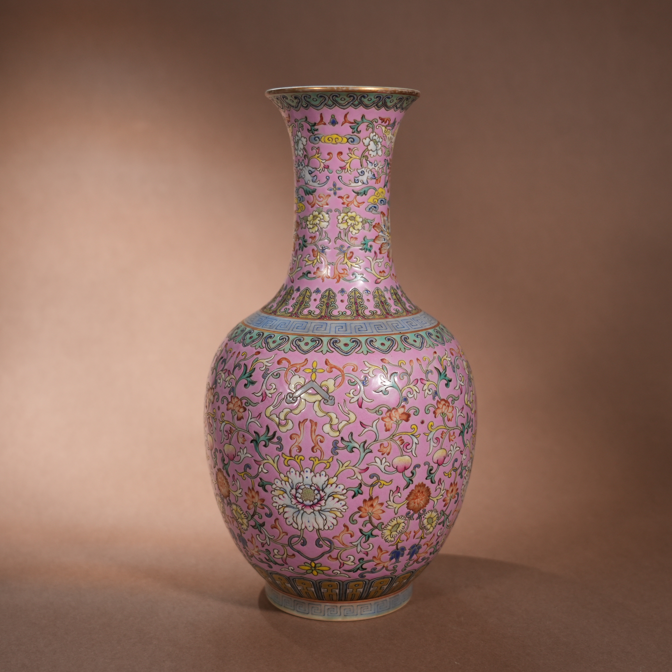 Ancient Chinese Famille Rose Vase with Interlocking Floral Patterns on Pink Ground