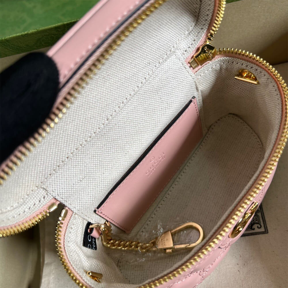 GG Matelassé top handle mini bag