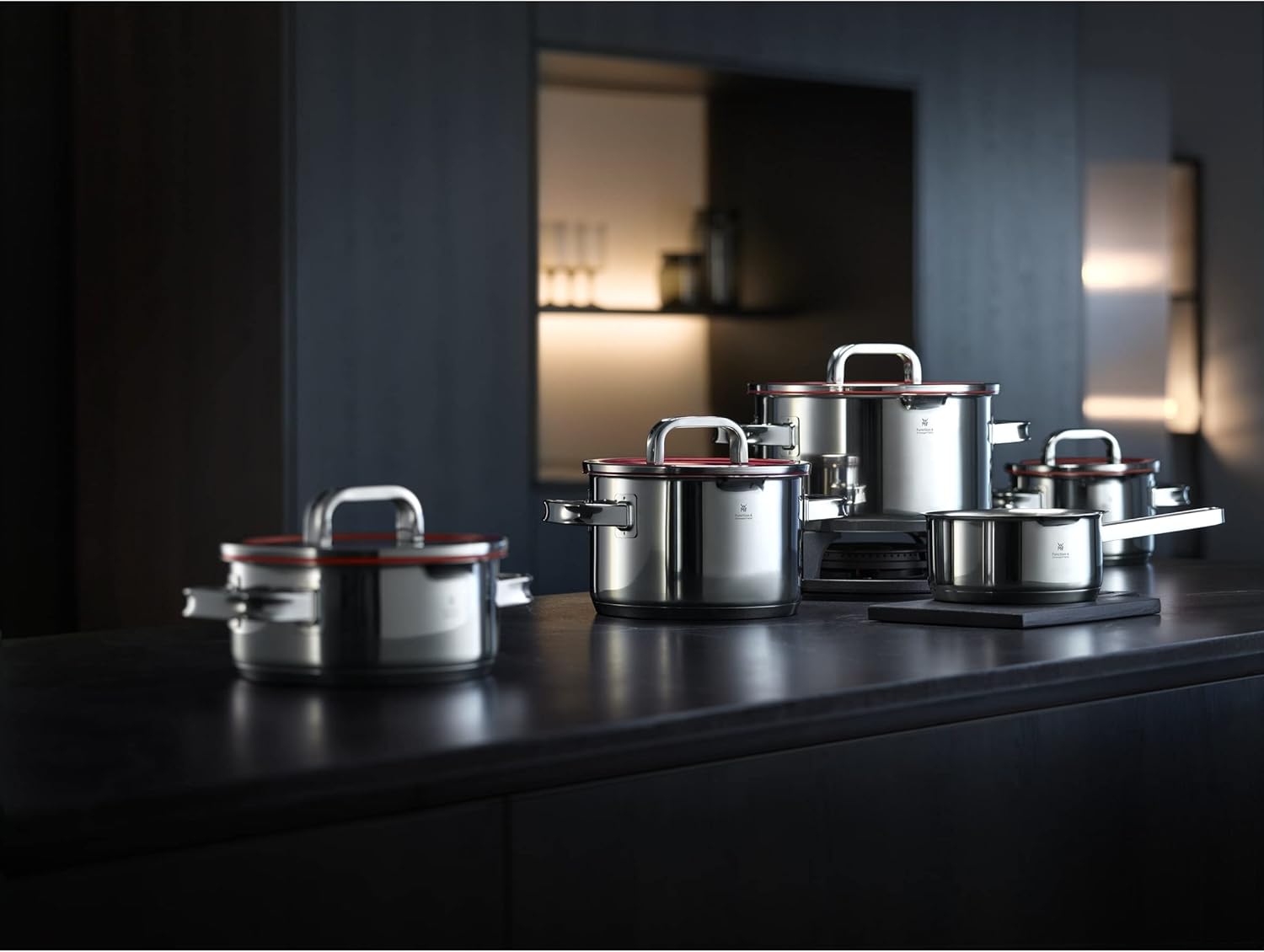 WMF Function 4 5-Piece Induction Saucepan Set. Glass Lid with 4 Pouring Functions. Polished Cromargan Stainless Steel. Induction Pots Set. Inner Scale