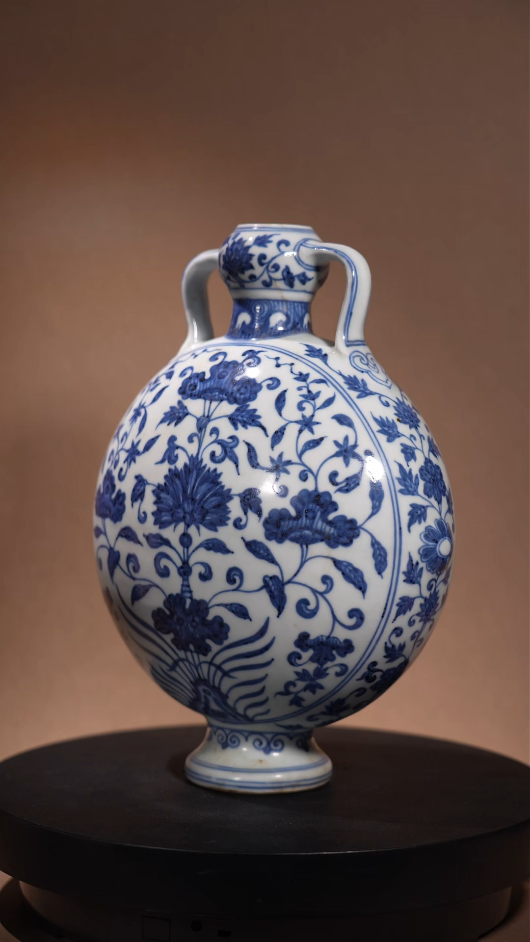 Ancient Chinese Blue and White Moon Flask with Interlocking Floral Motifs
