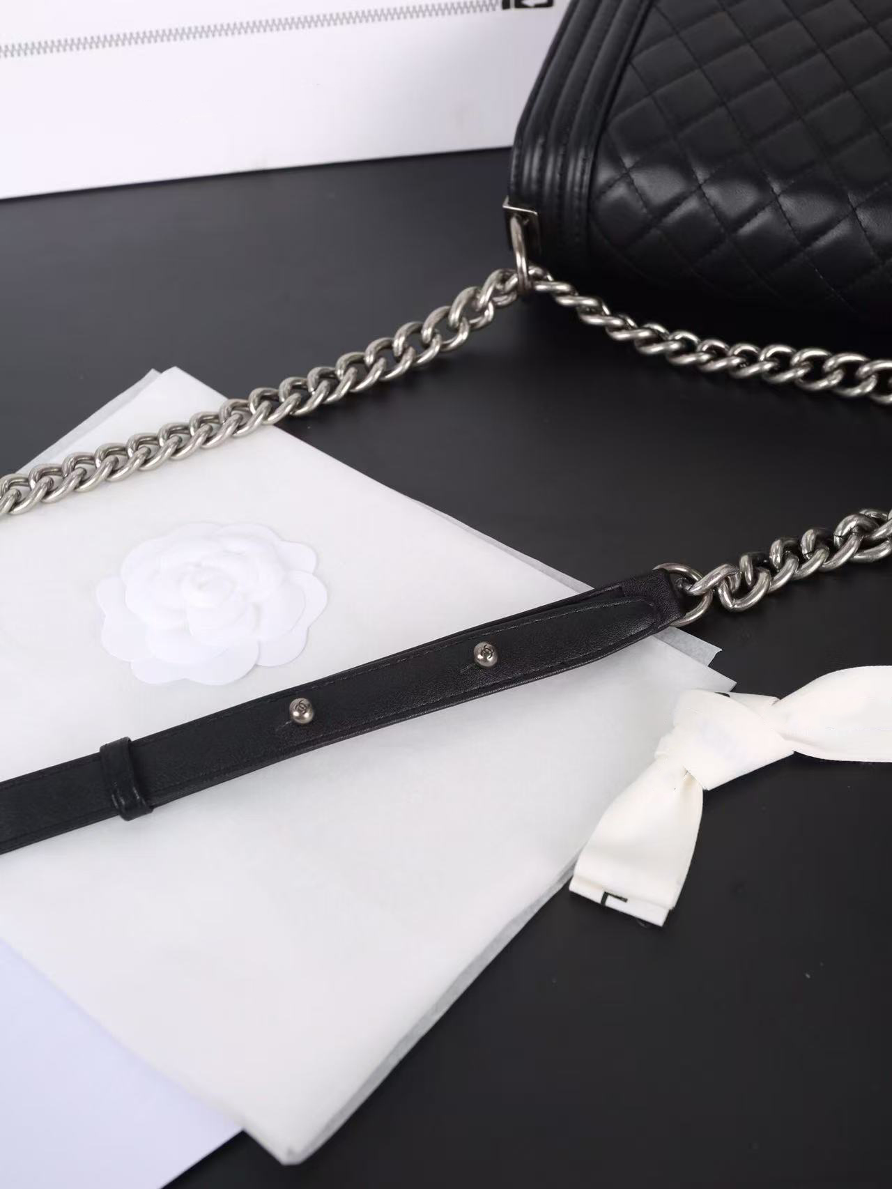 Silver buckle shoulder bag