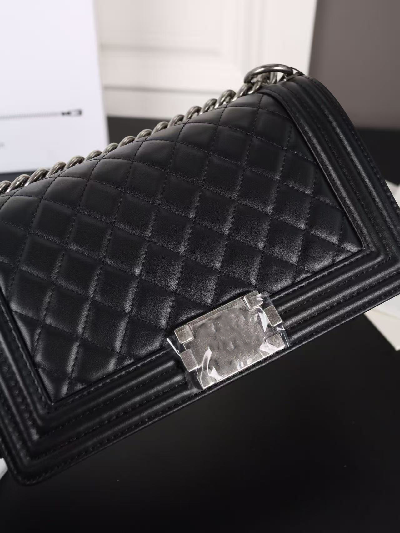 Silver buckle shoulder bag