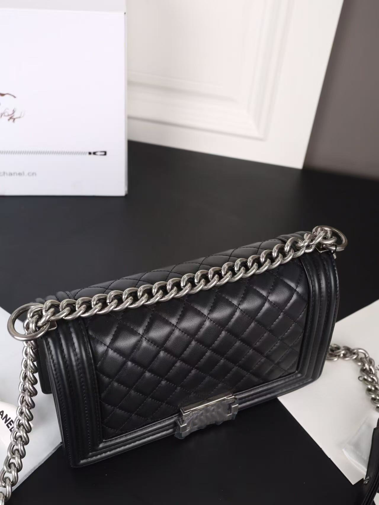 Silver buckle shoulder bag