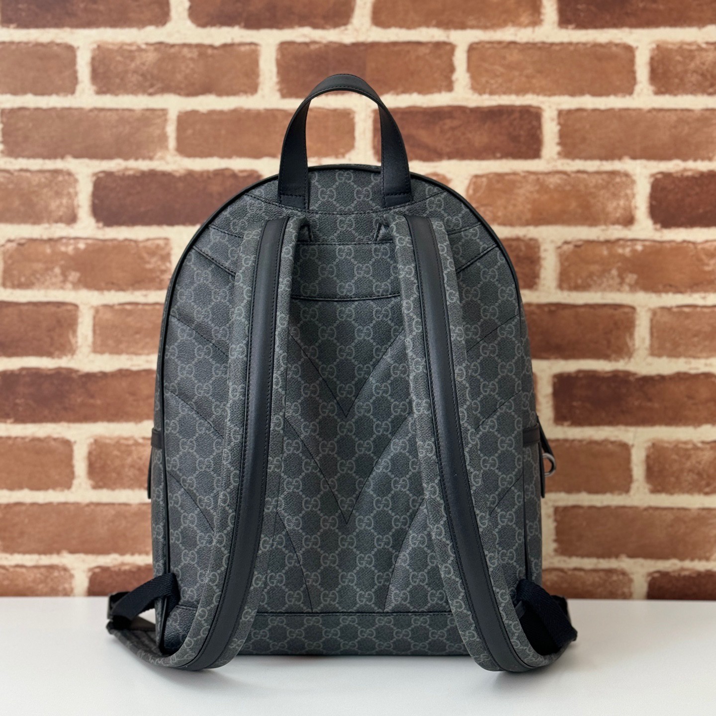 GUCCI Emblem GG medium backpack