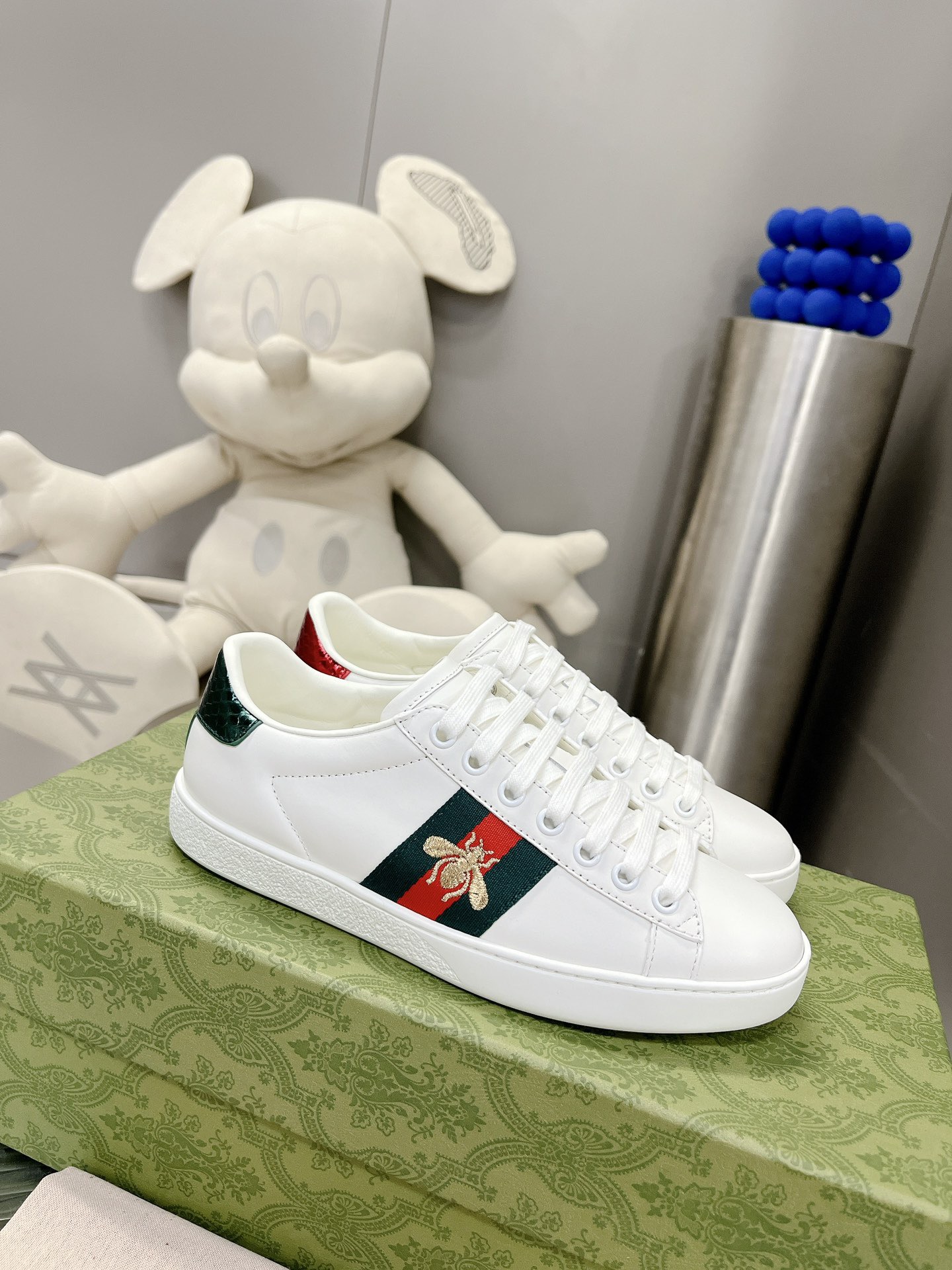 Gucci couple's high-top white shoes