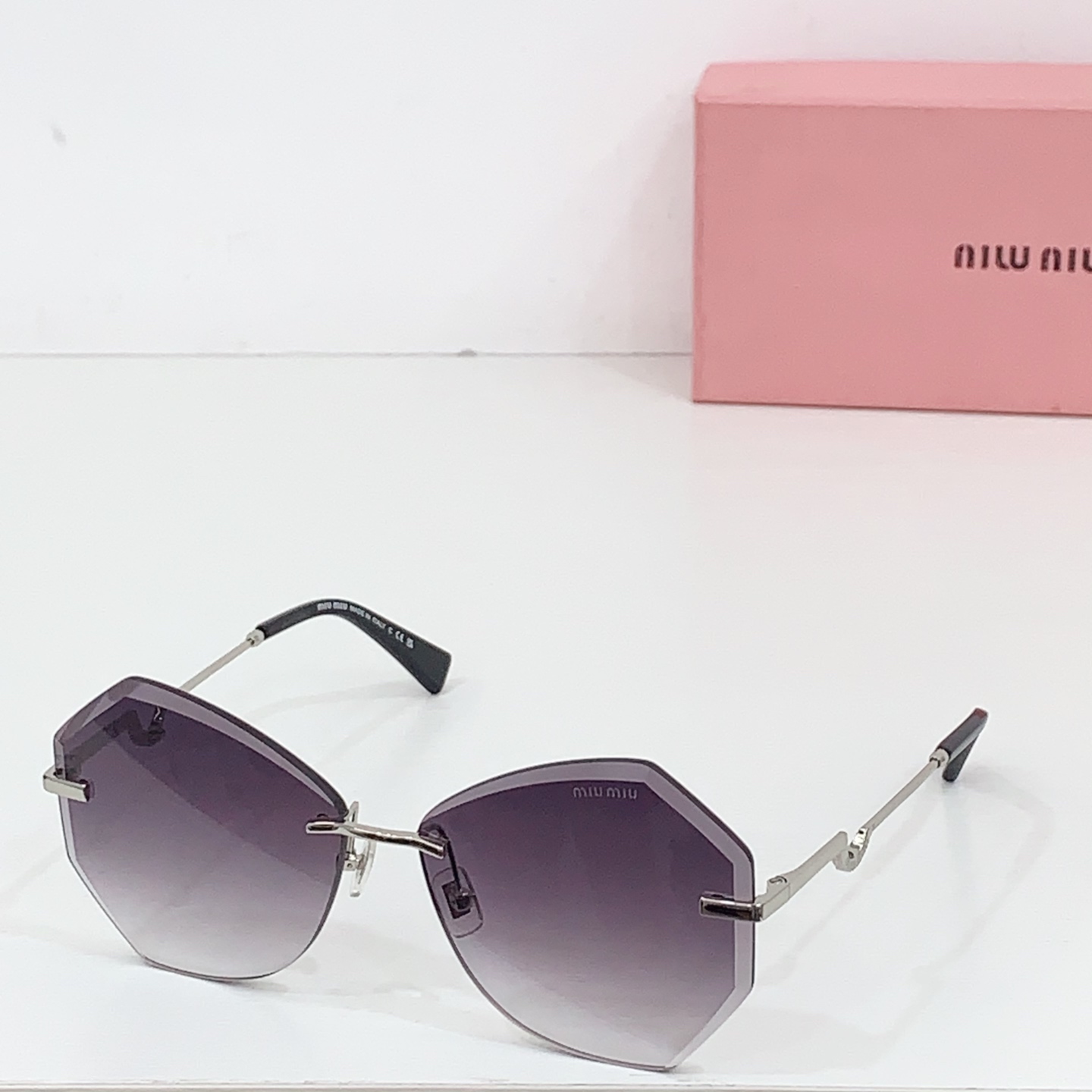 Miumiu frameless sunglasses