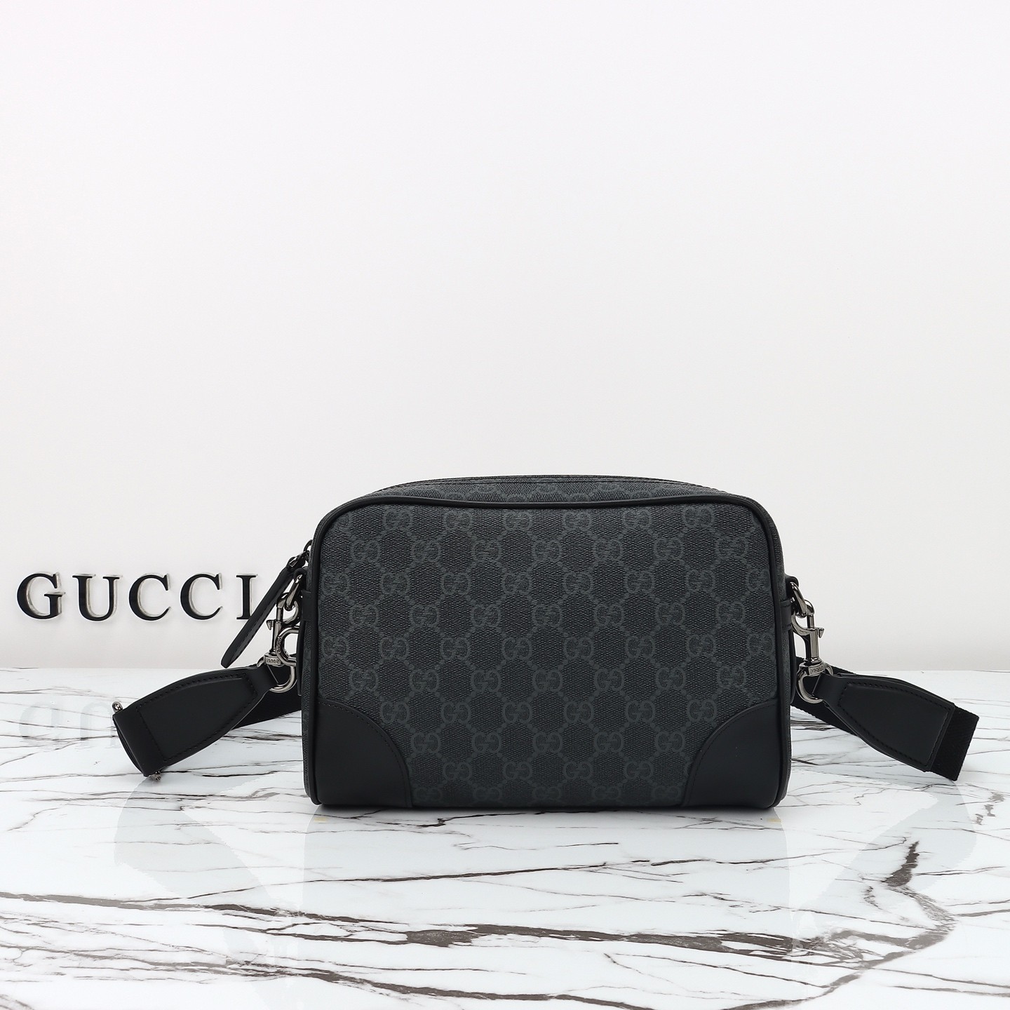 GUCCI Emblem GG small crossbody bag