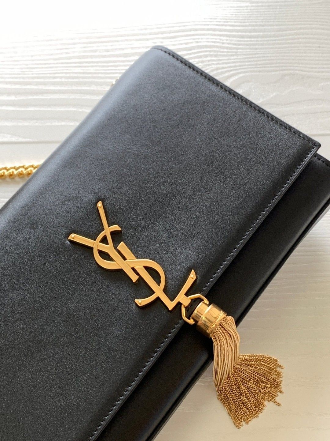 Saint Laurent YSL KATE medium bag in grained leather with tassels