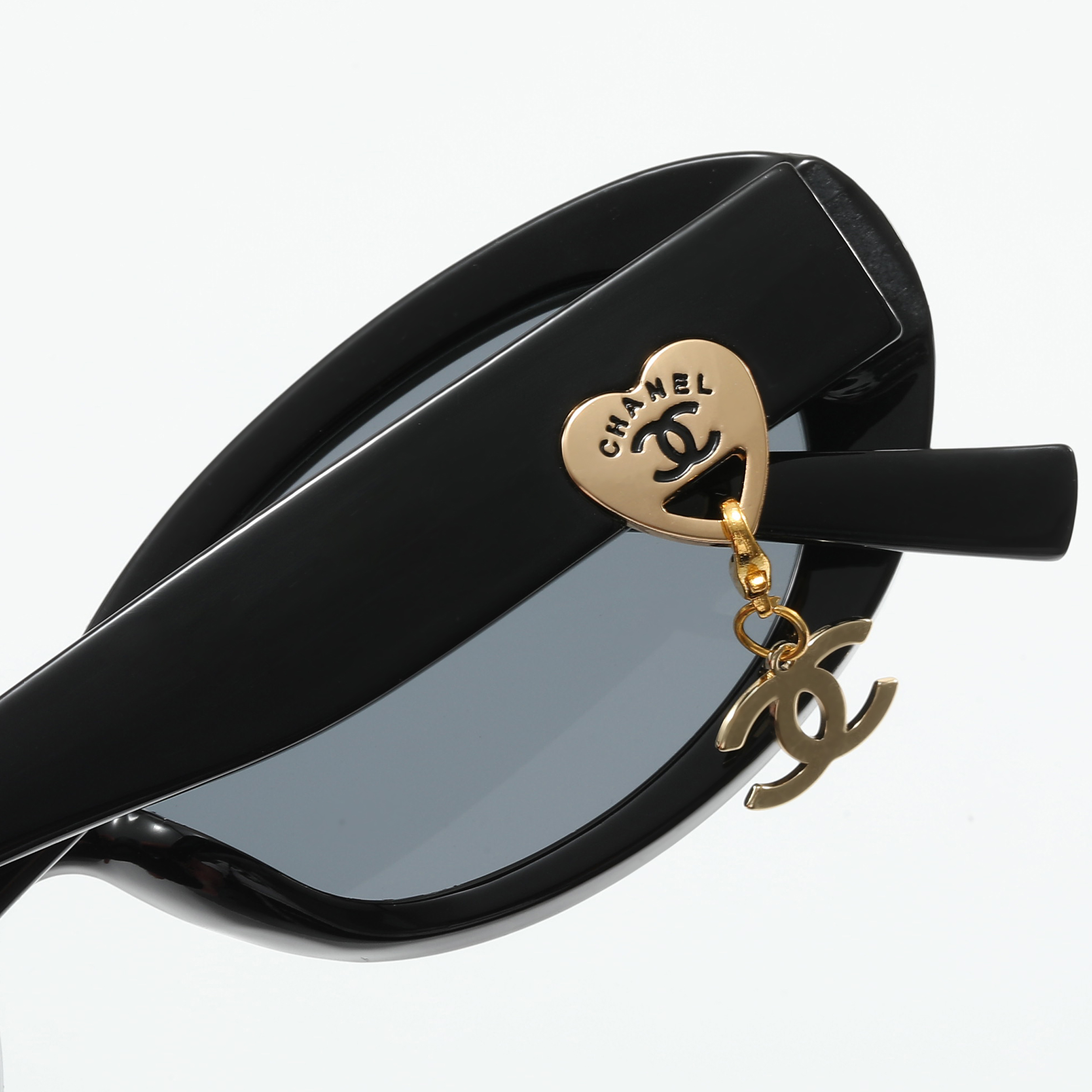 Chanel logo pendant on temple sunglasses