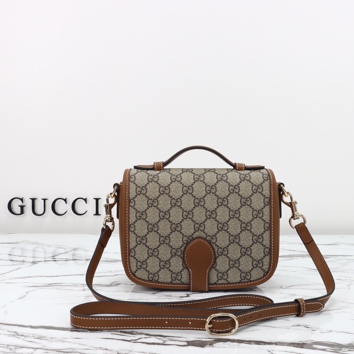 GUCCI Emblem GG mini shoulder bag