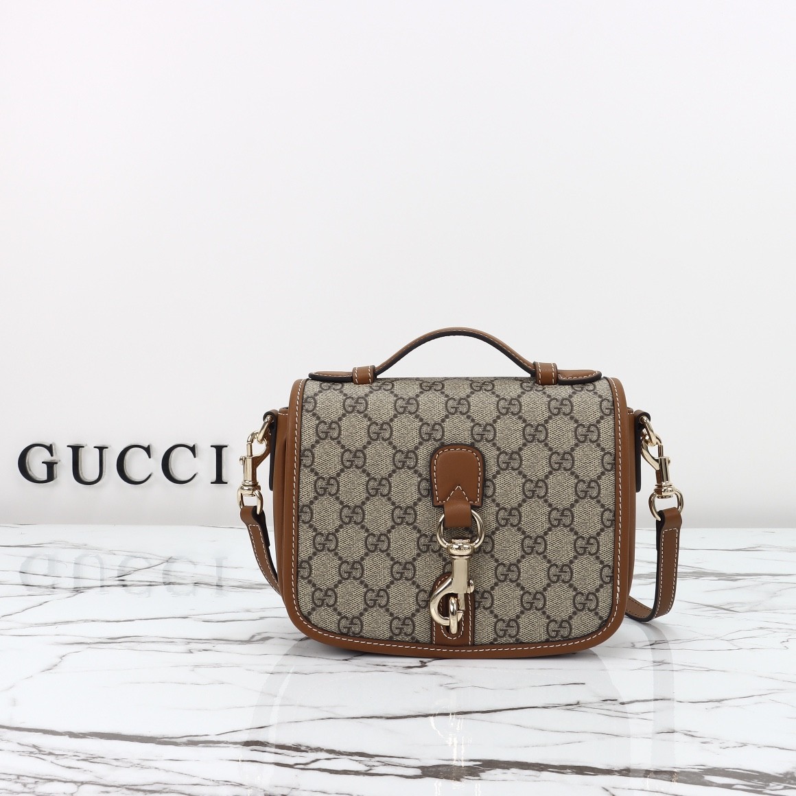 GUCCI Emblem GG mini shoulder bag