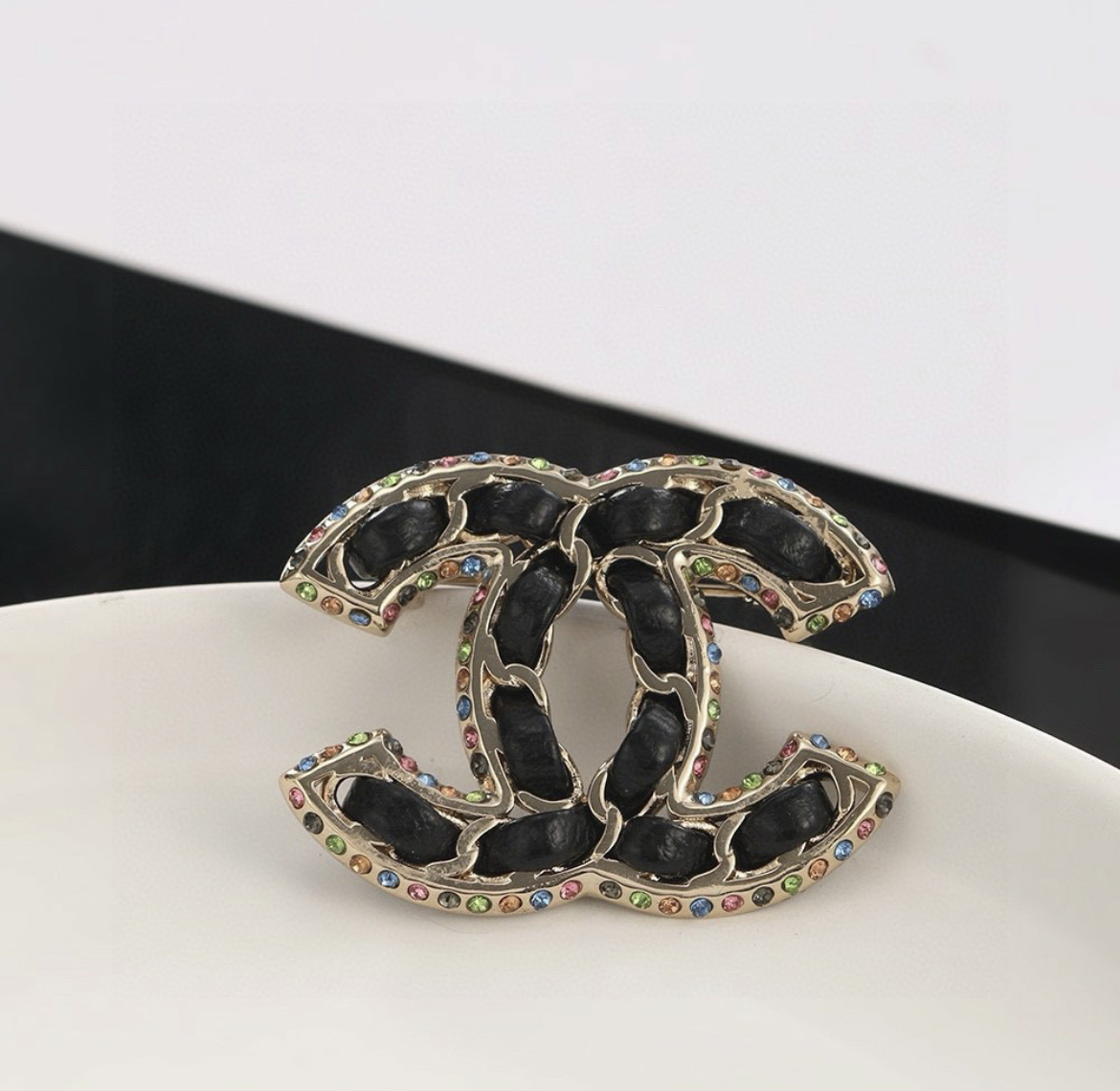 Chanel new classic black leather brooch with colored diamonds Jewelry