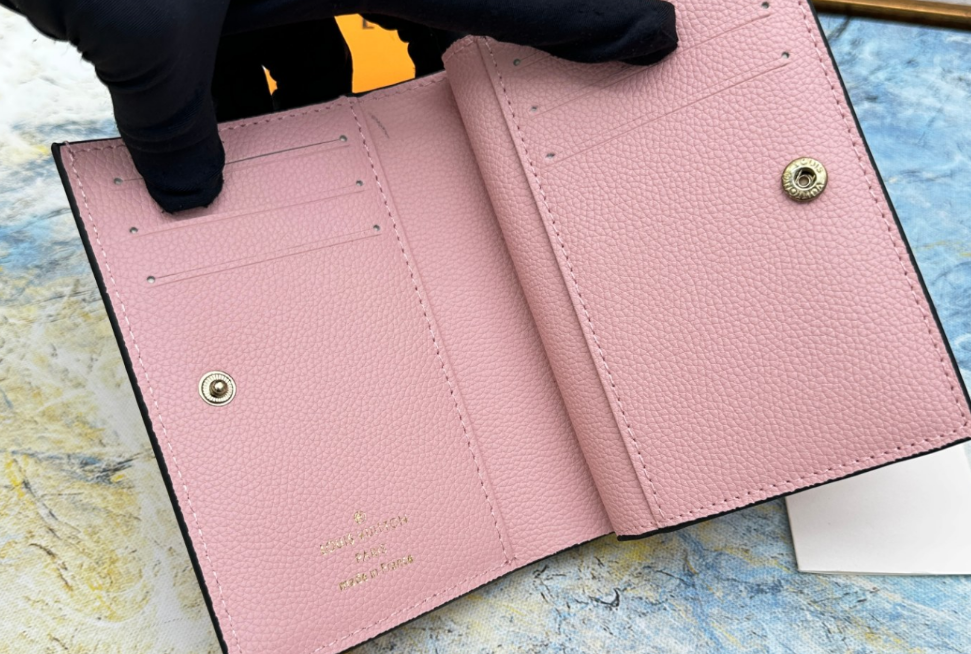 Louis Vuitton Top grain cowhide embossed zipper wallet