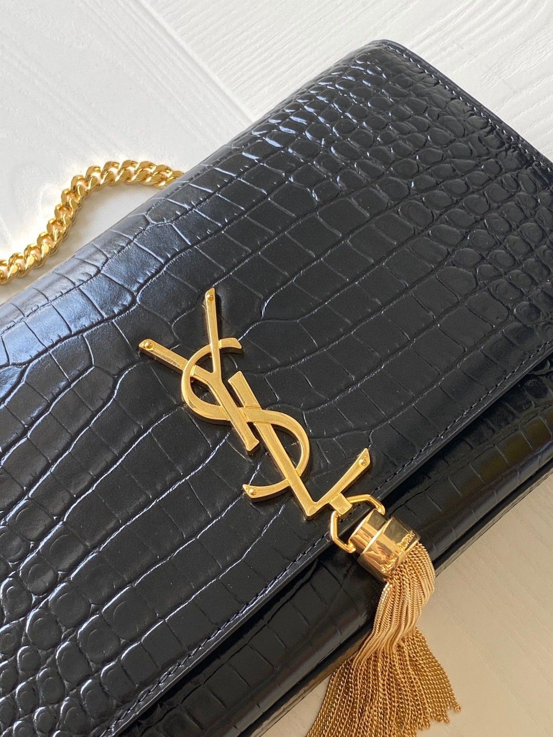 Saint Laurent YSL KATE medium bag in crocodile-embossed leather with tassels