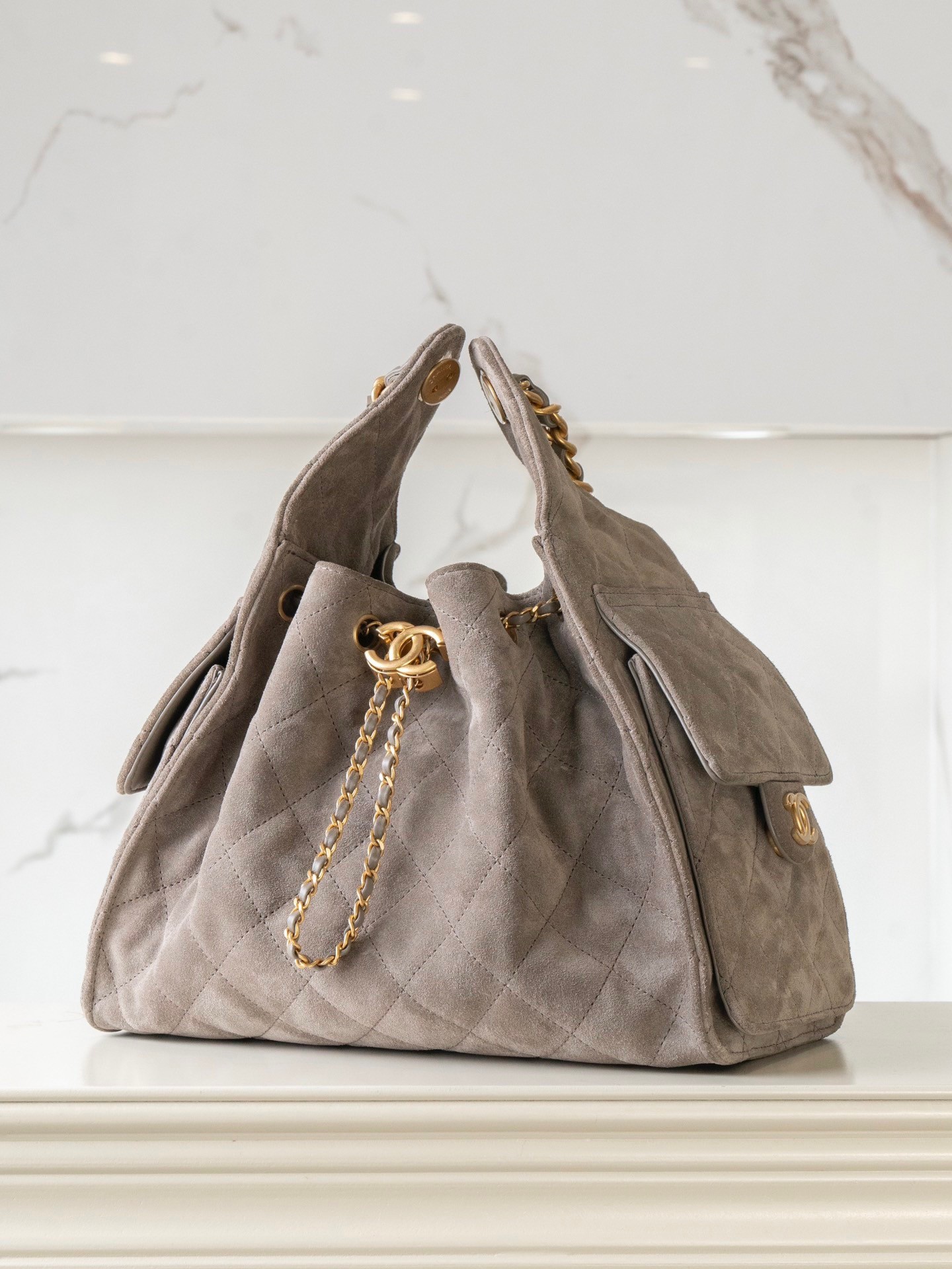 Chanel Small suede hobo drawstring bucket bag