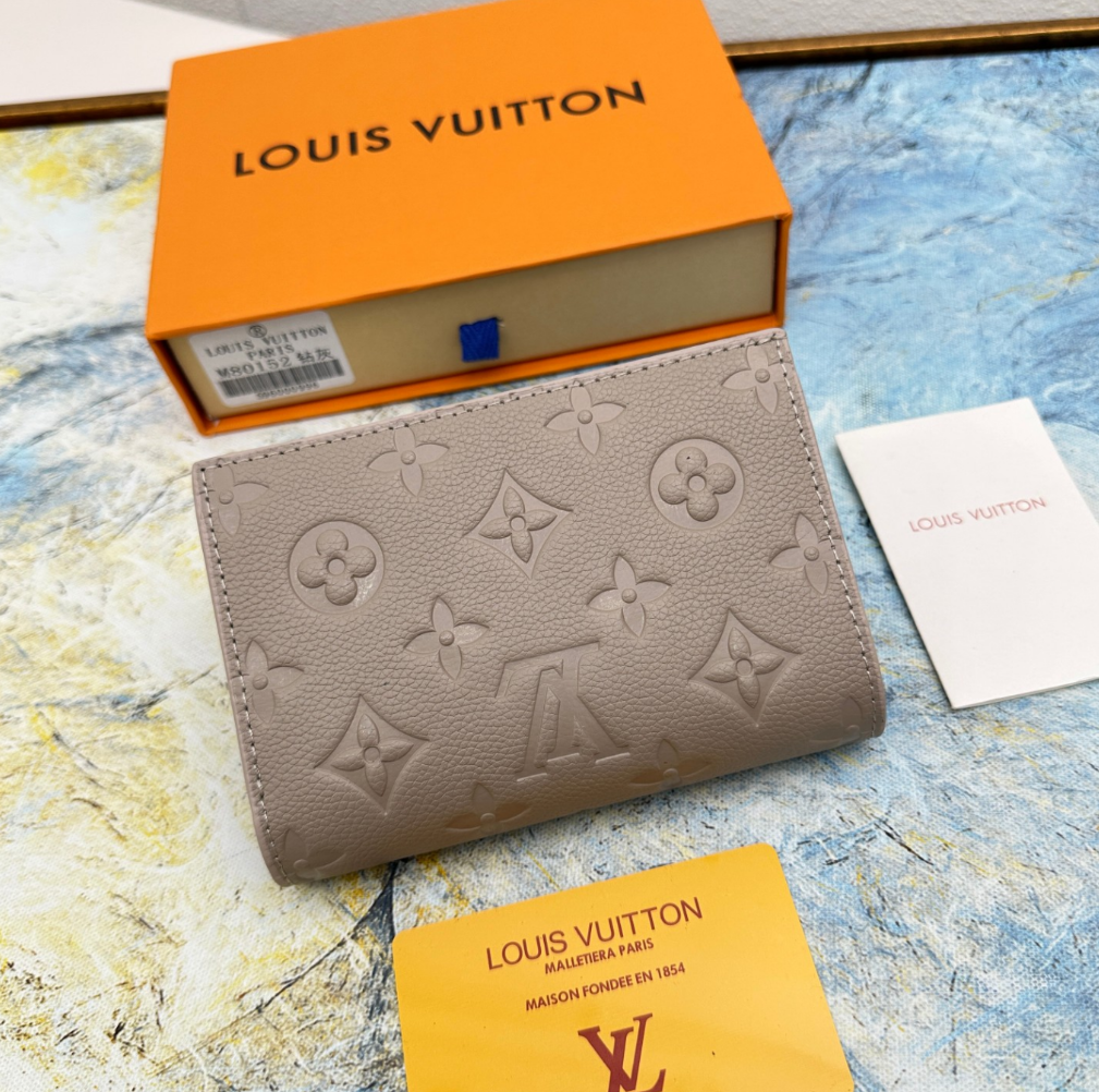 Louis Vuitton Top grain exquisite cowhide embossed zipper dark wallet