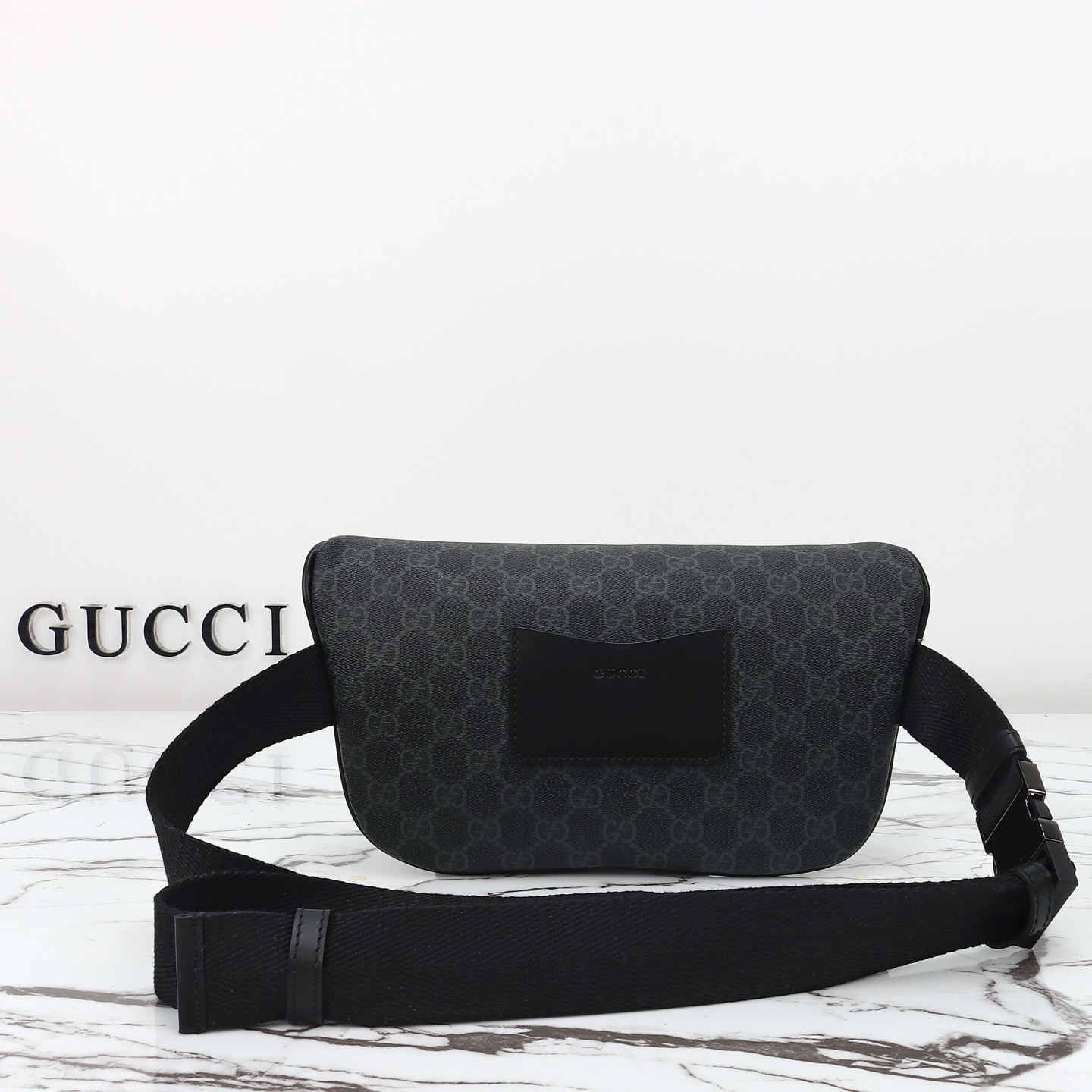 GUCCI Emblem GG medium belt bag