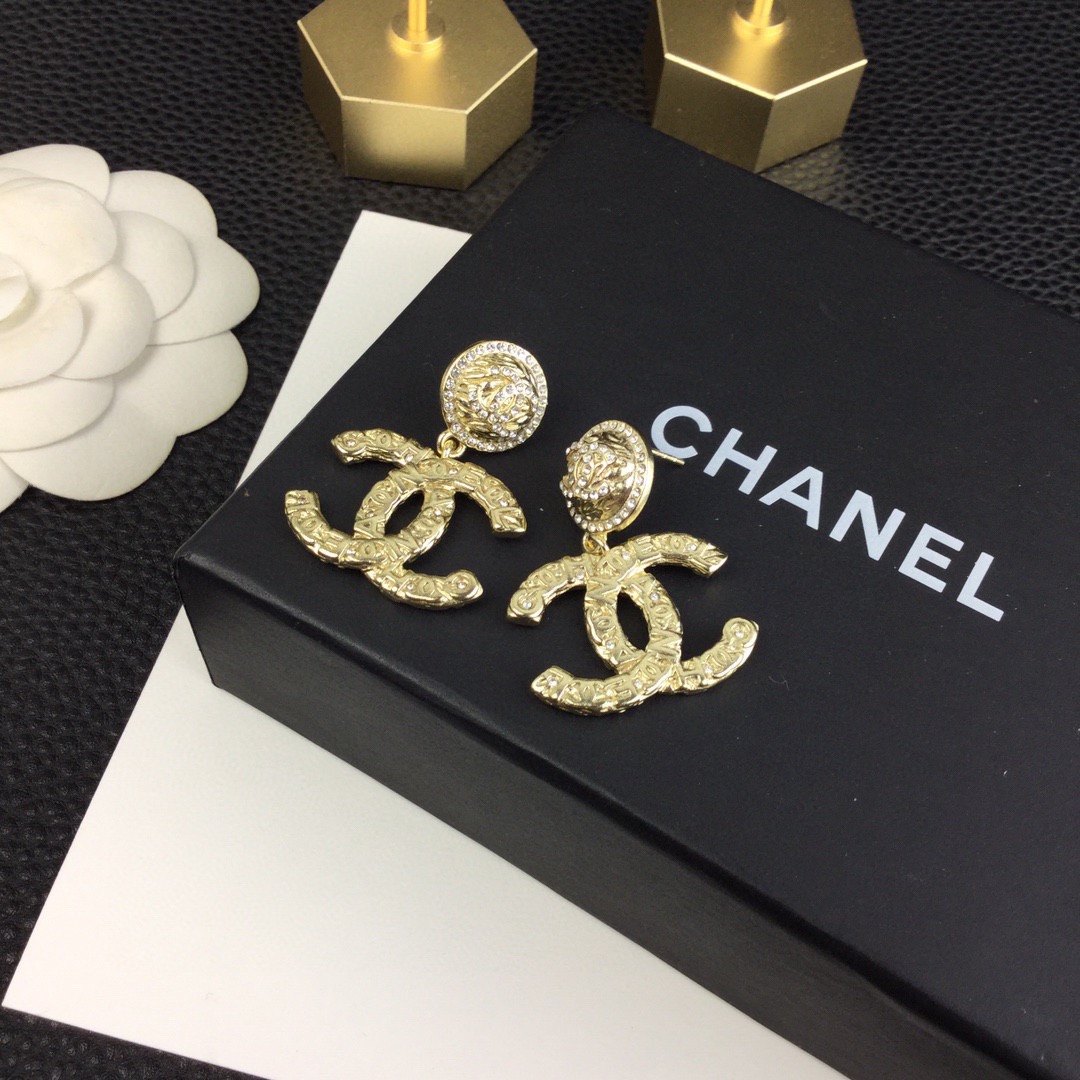 Chanel embossed double c drop earrings
