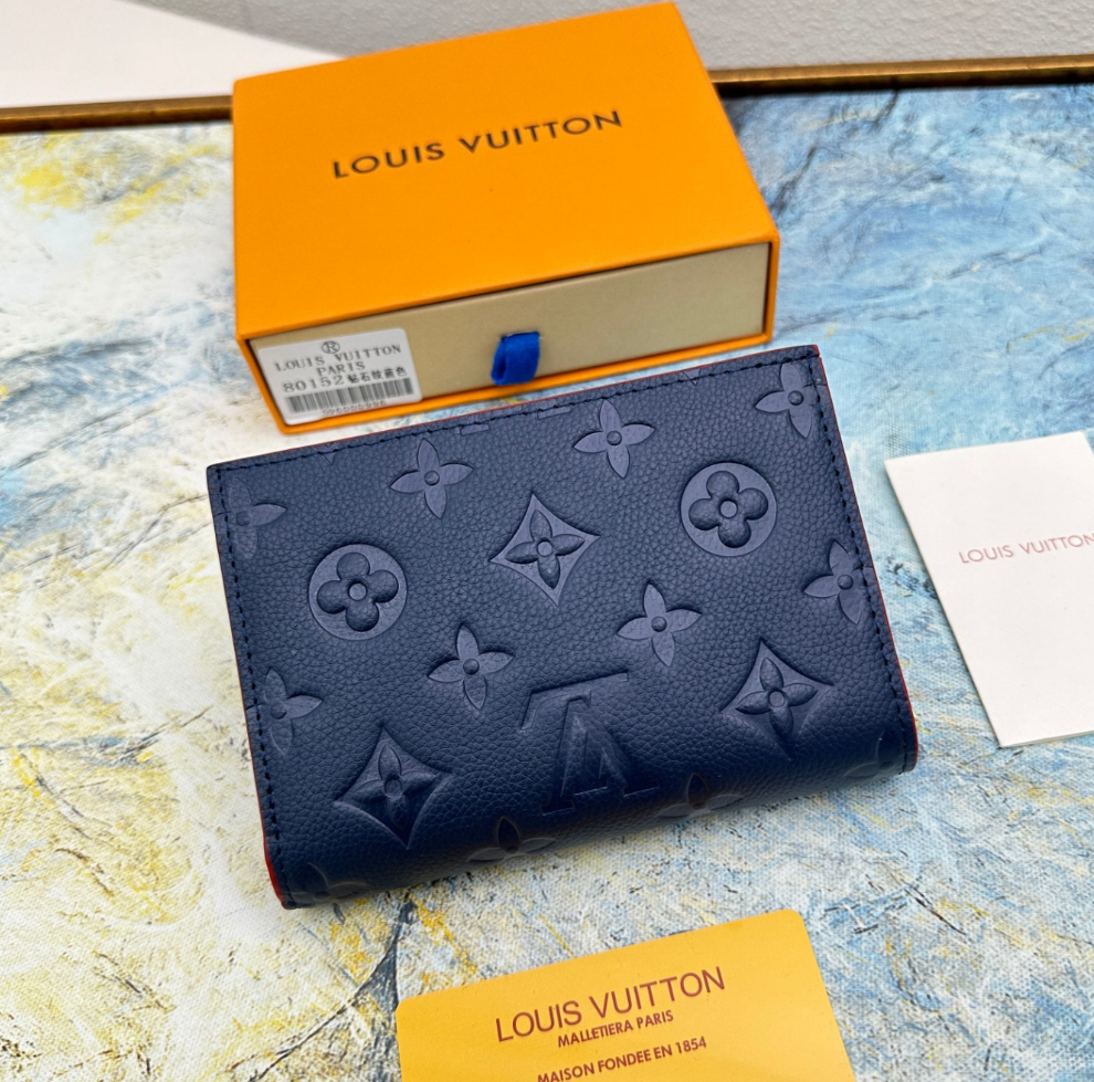 Louis Vuitton Top grain cowhide embossed zipper dark wallet