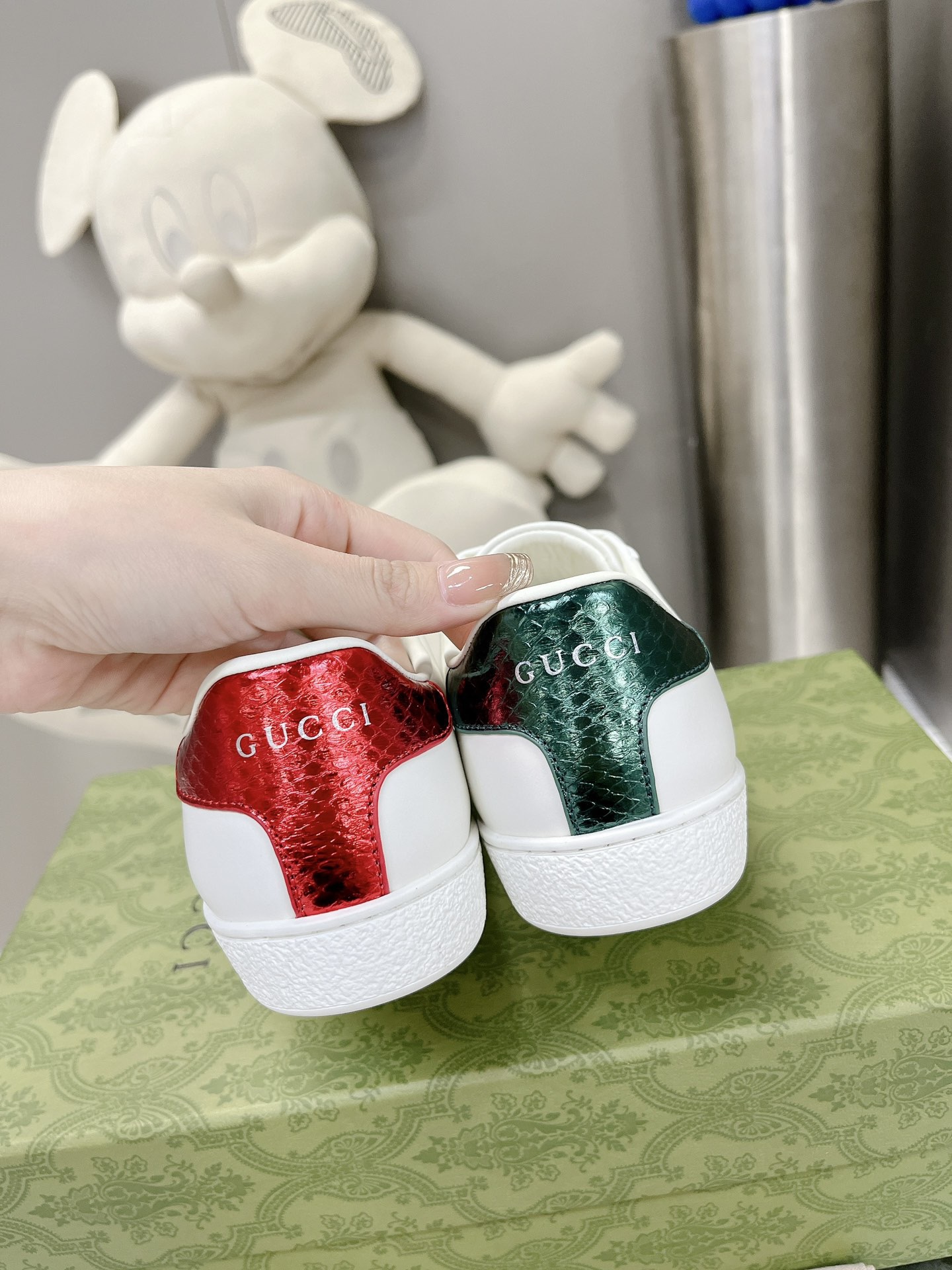 Gucci couple's high-top white shoes