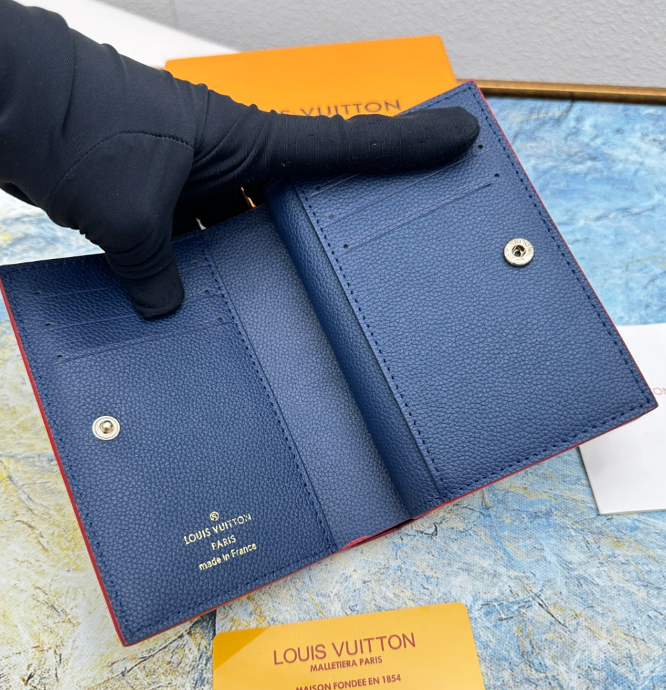 Louis Vuitton Top grain cowhide embossed zipper dark wallet