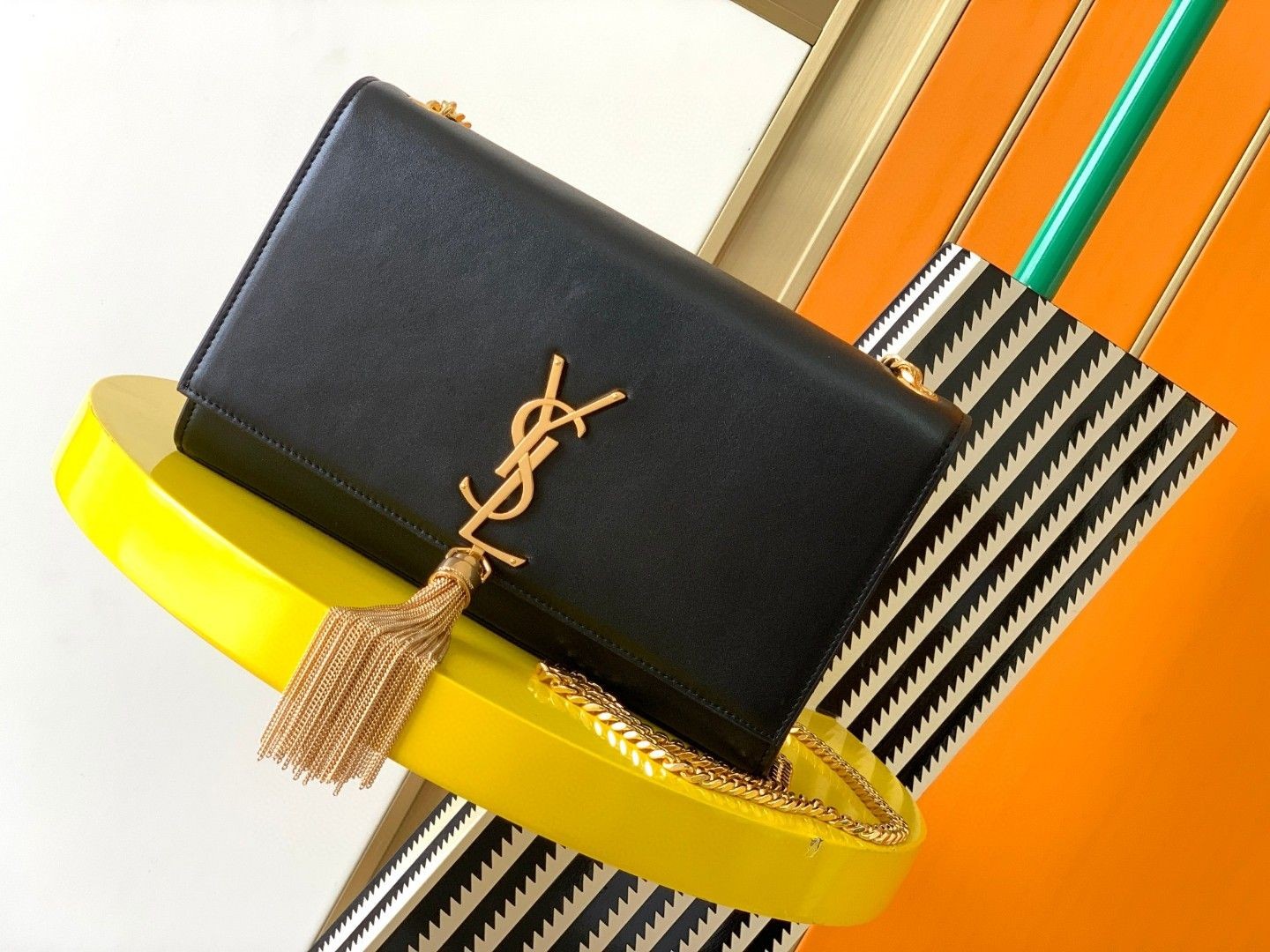 Saint Laurent YSL KATE medium bag in grained leather with tassels