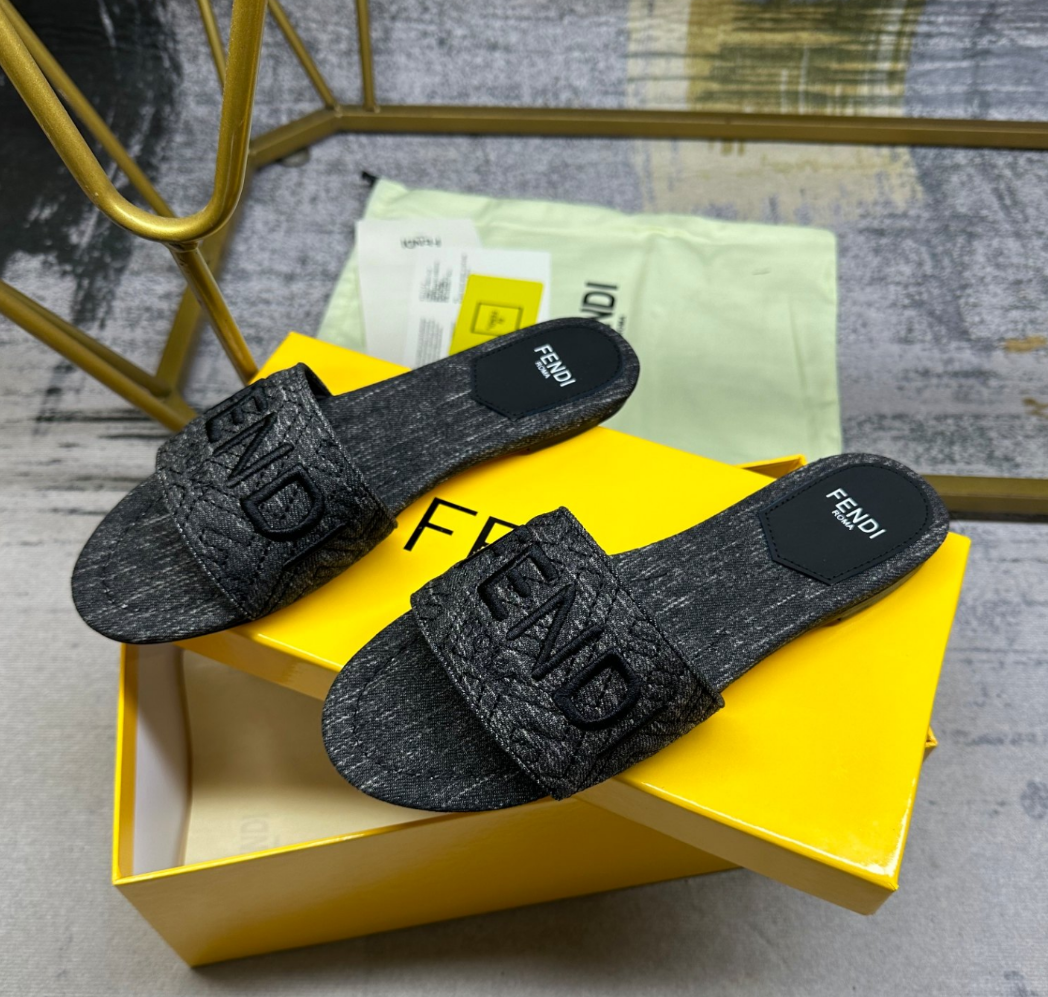 Fendi's new wide decorative striped flat canvas slippers