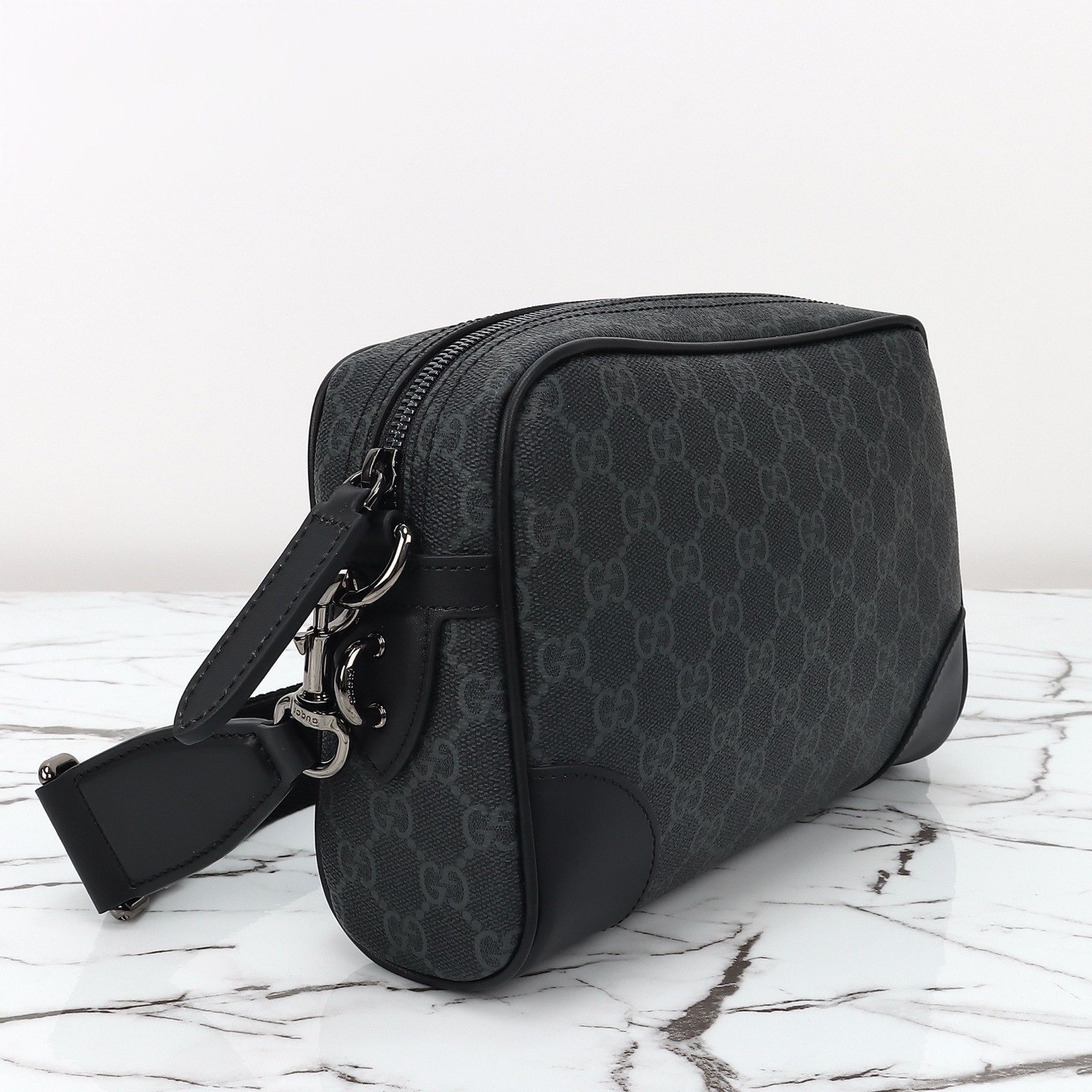 GUCCI Emblem GG small crossbody bag
