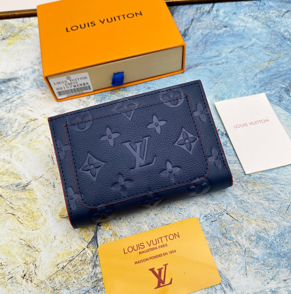 Louis Vuitton Top grain cowhide embossed zipper dark wallet