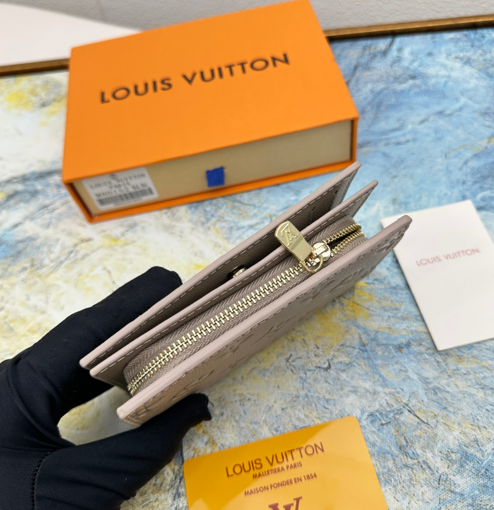 Louis Vuitton Top grain exquisite cowhide embossed zipper dark wallet