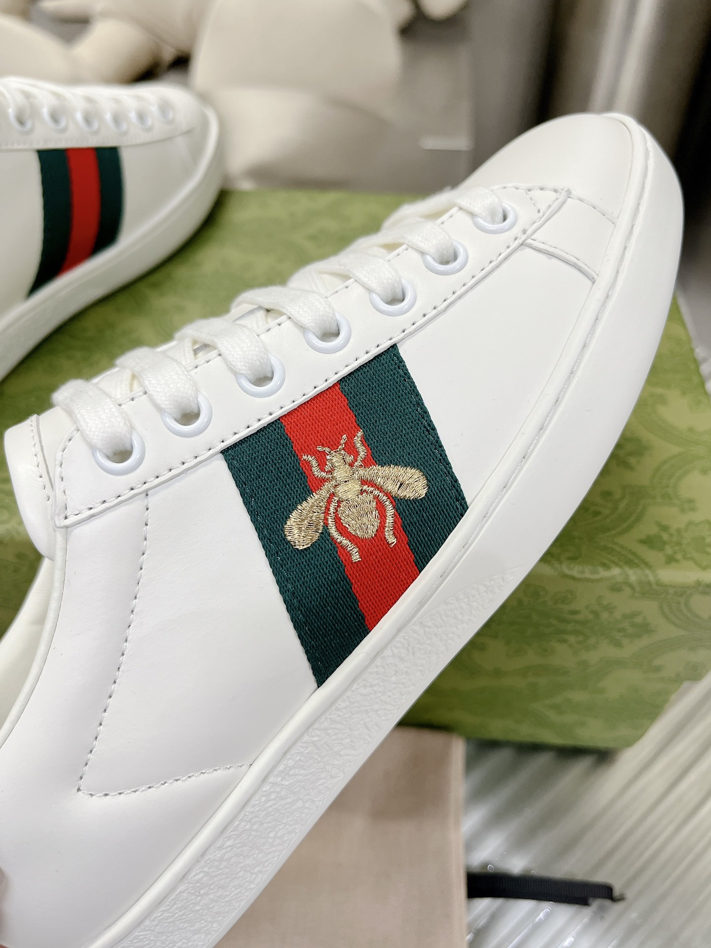 Gucci couple's high-top white shoes